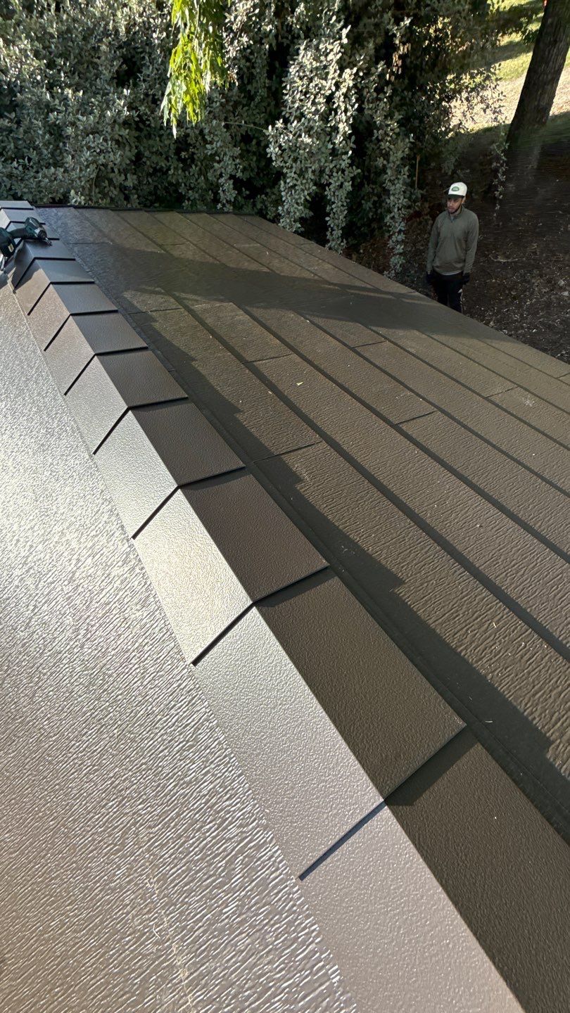 Roof replacement using GAF TimberSteel by American Home Contractors
