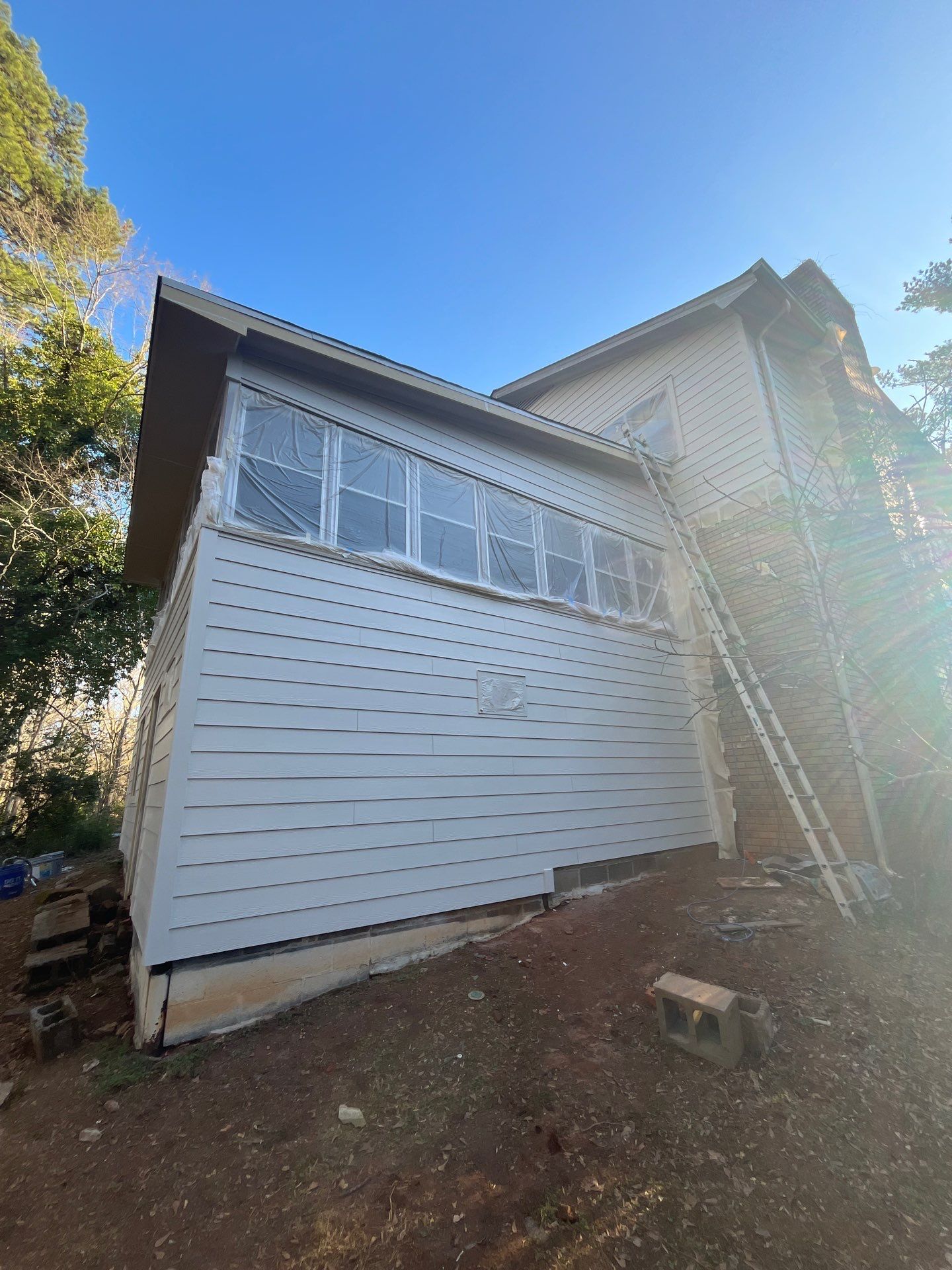 Board and Batten Siding Installation and Railing Replacement in Lilburn, GA by Nelson Exteriors 