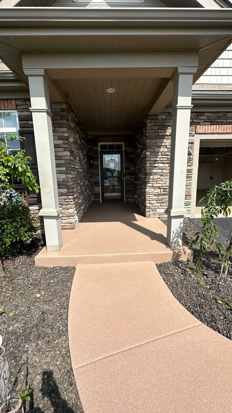 Porch + Walkway + Garage Project in Renfrew by Floors in a Day, Inc