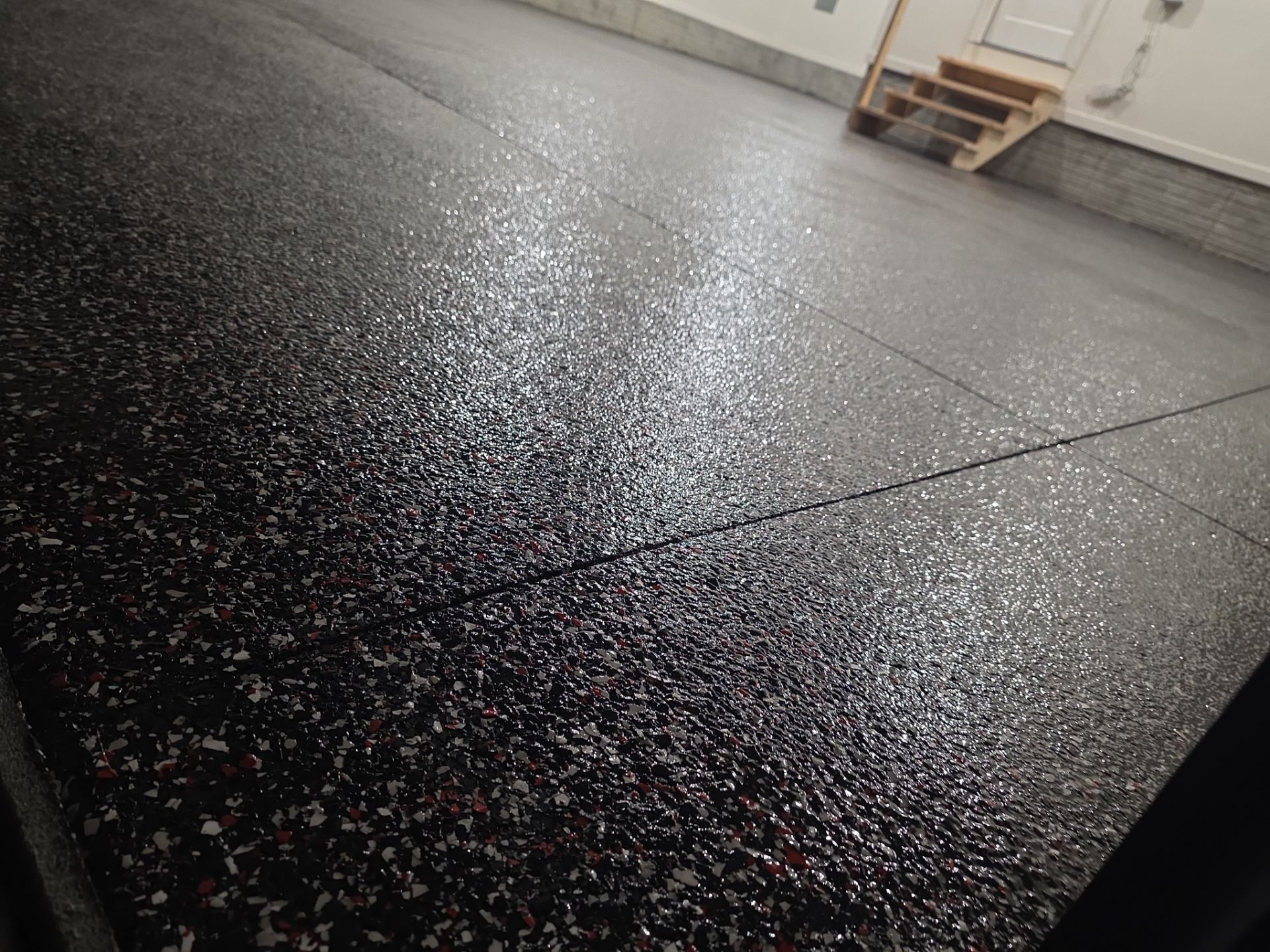 Husker-Style Garage by Revival Concrete Coatings