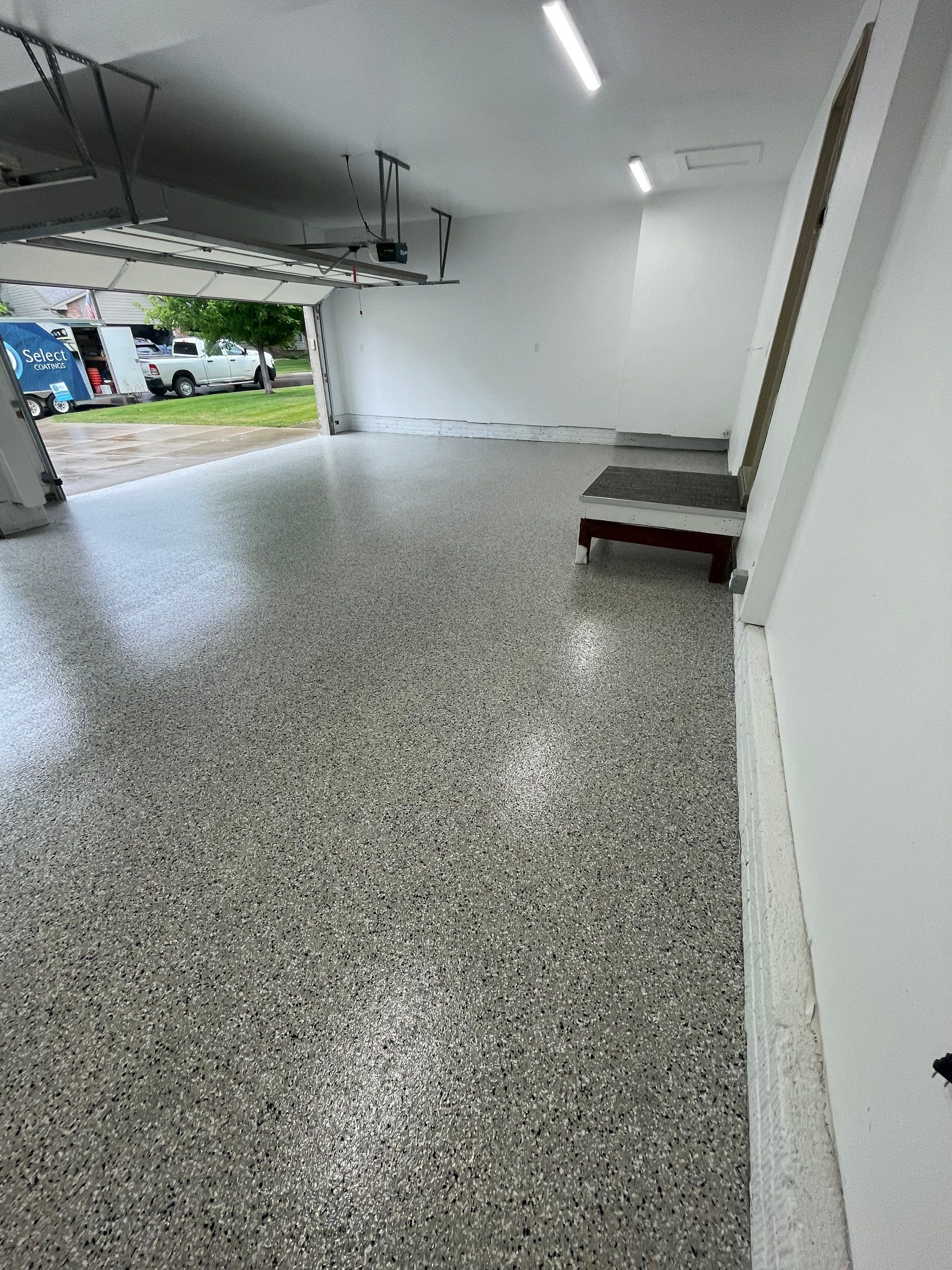 Cabin Fever Garage Floor System in Sioux Falls by Select Painting, Coatings & Garage Cabinets