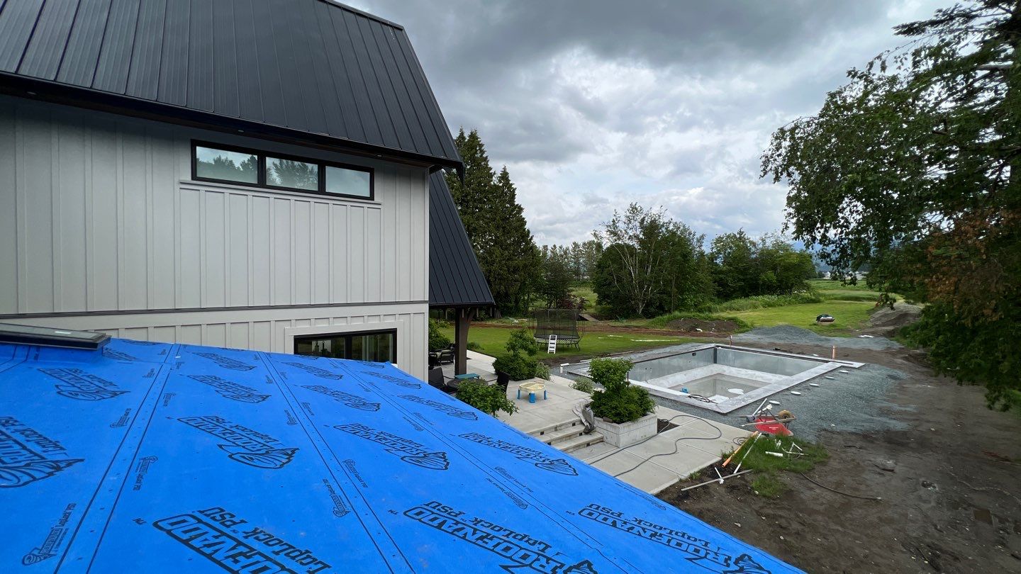 Commercial Roofing Installation using 12" Prolok metal  by Top Notch Roofing Inc