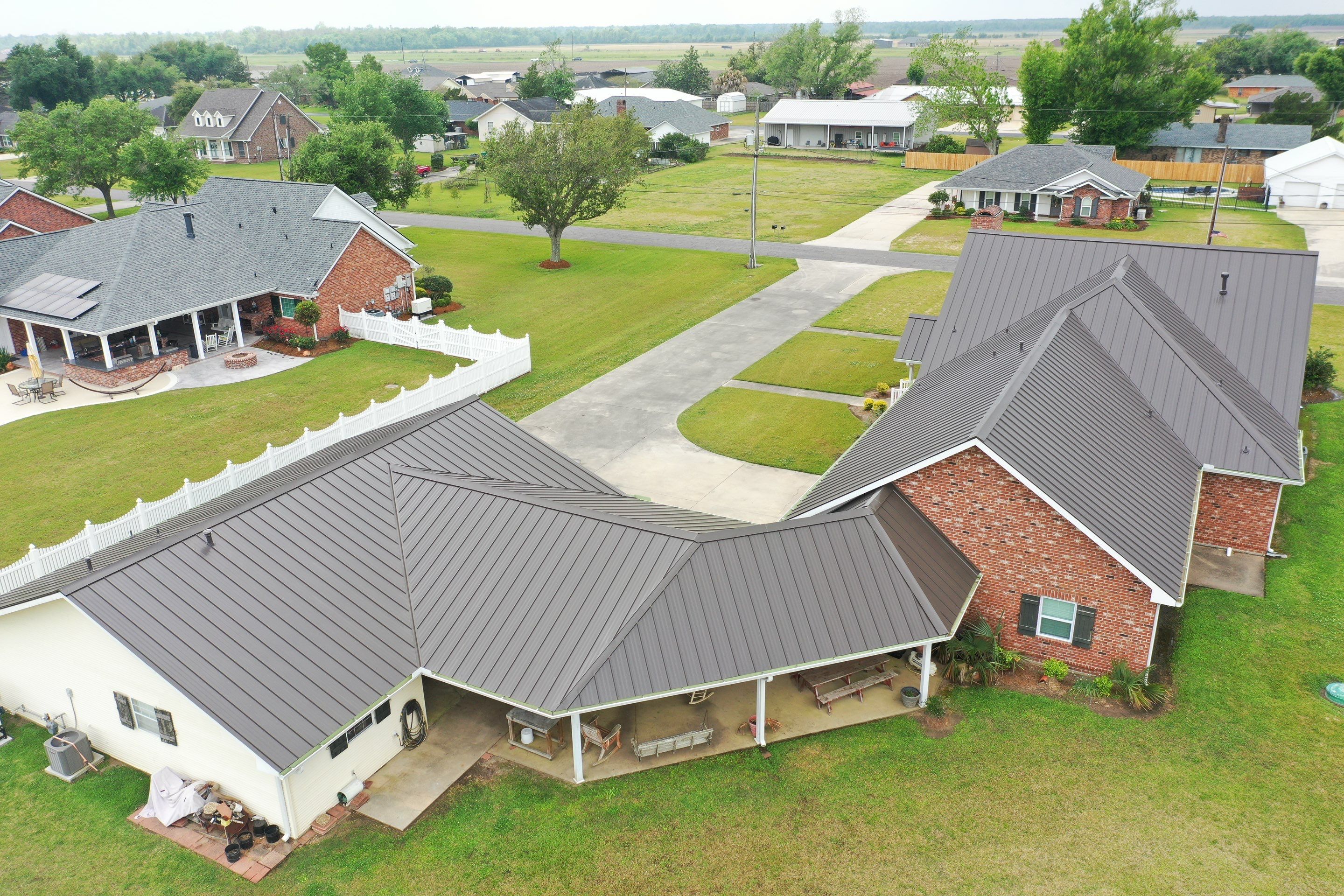 Standing Seam Metal Roof Installation by Top Team Construction