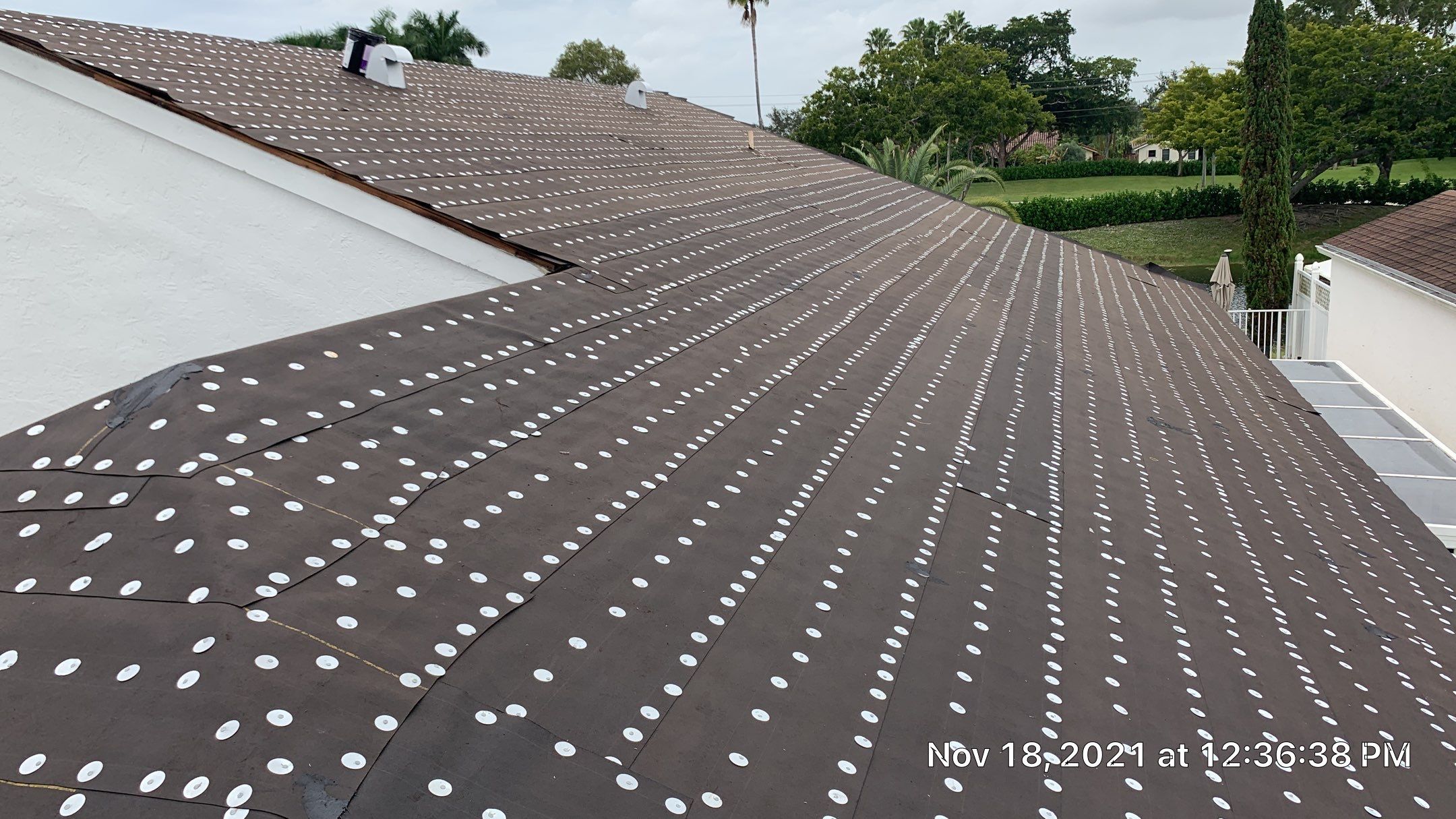 Residential Roofing Installation using 1" Nail strip metal roof by BLUES BROTHERS CONSTRUCTION CORP