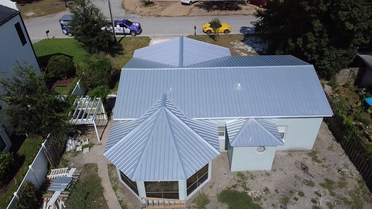 Metal Roof Project in Winter Park, FL by Gravity Roofing LLC