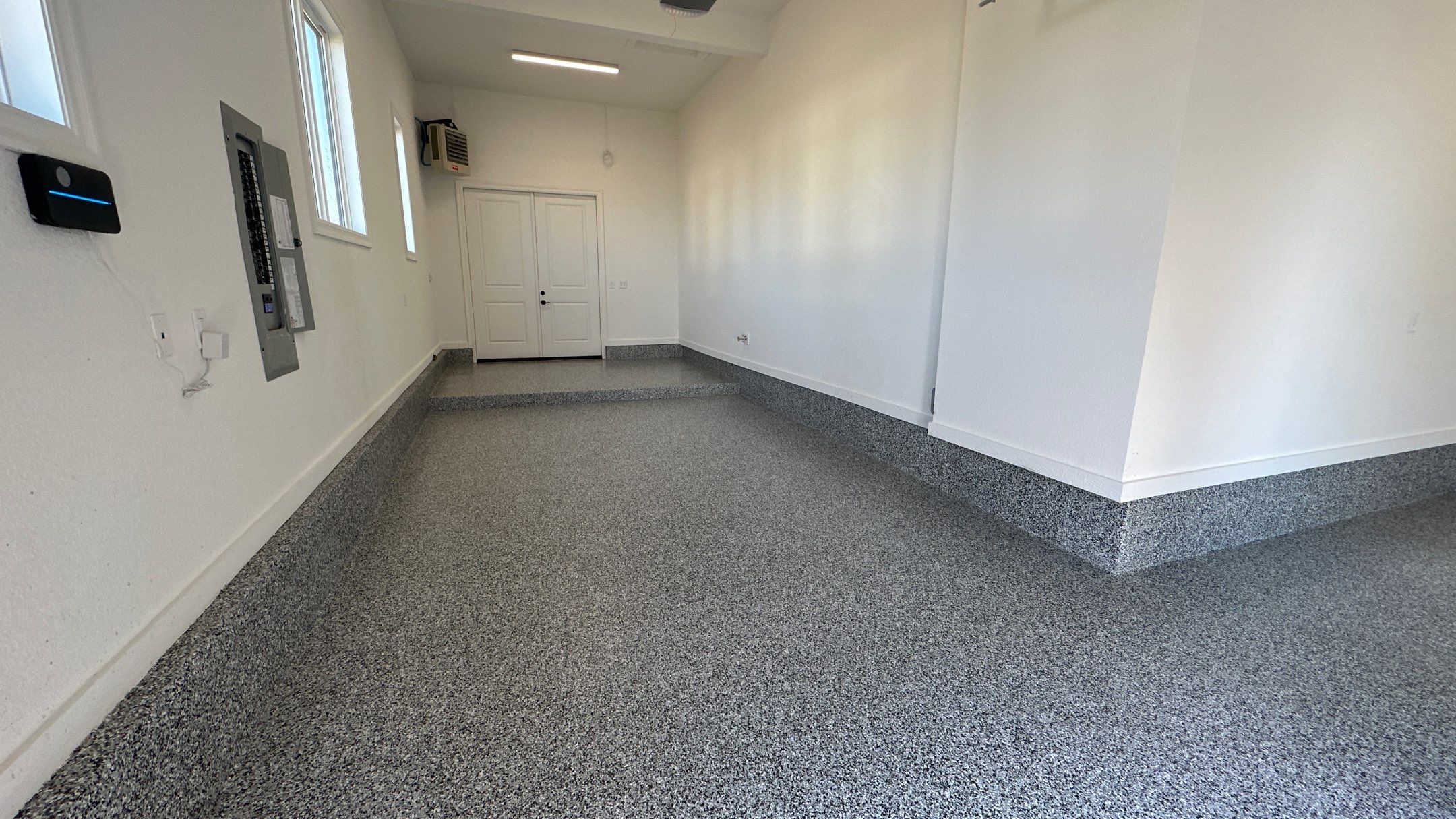Mike & Pam transformed their garage with a Banner Garage Floor and Cabinets by Banner Garage