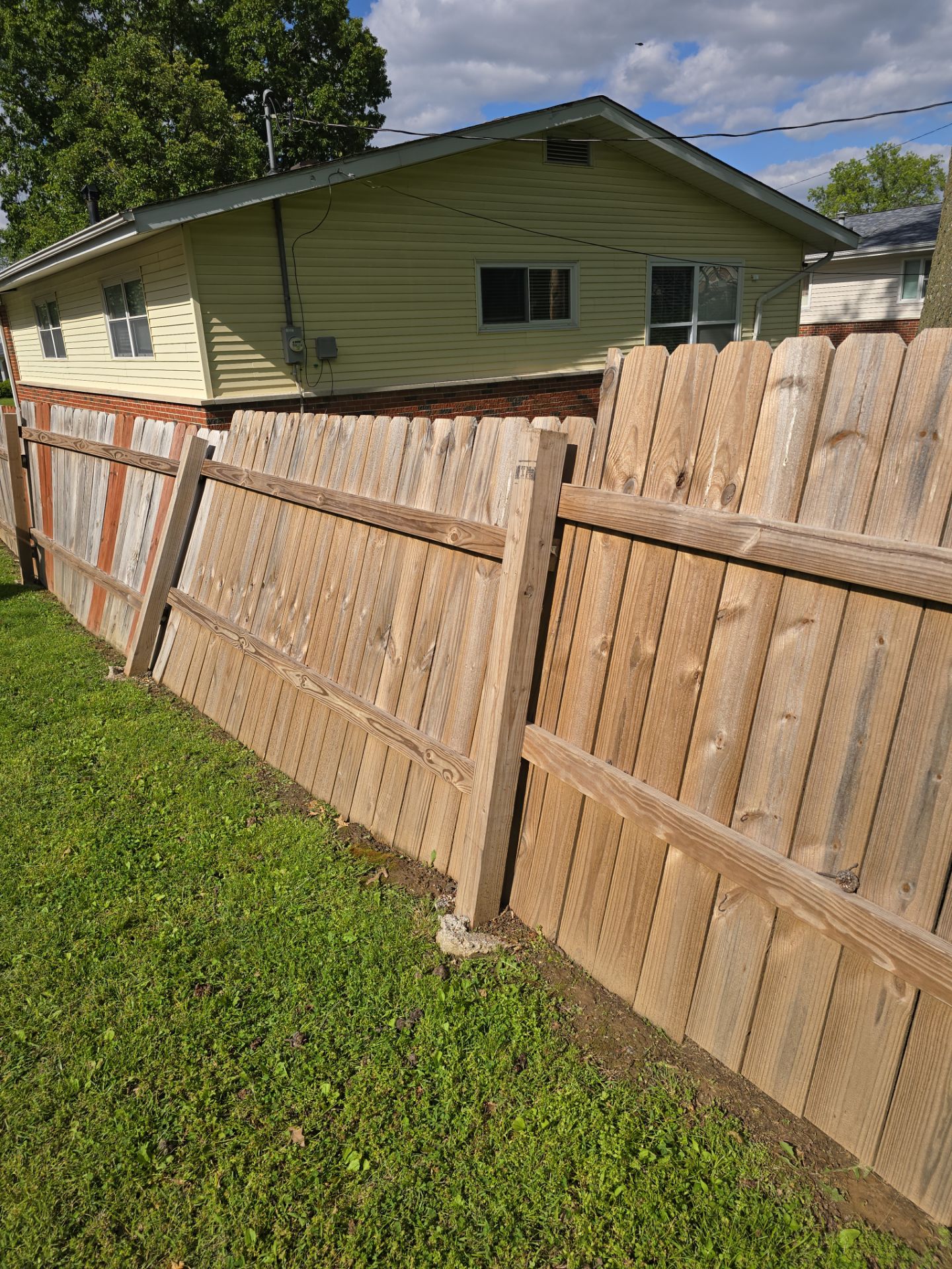 Wood Fence Post Replacement & Stabilization – Florissant, MO by Legendary Services Company LLC.
