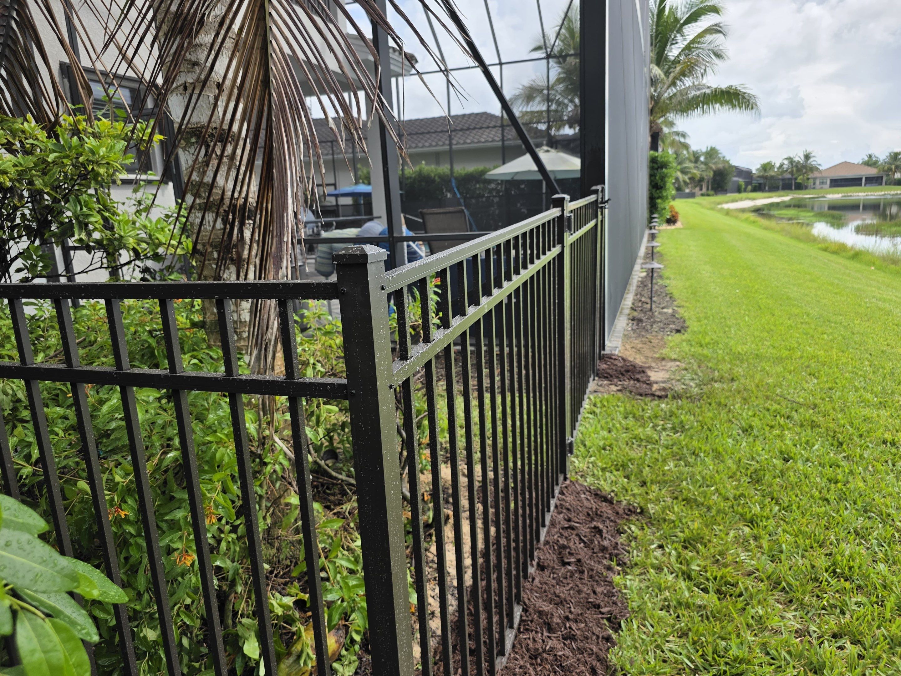 Black Aluminum Picket Fence and Gate Installation in Naples by True Fence LLC