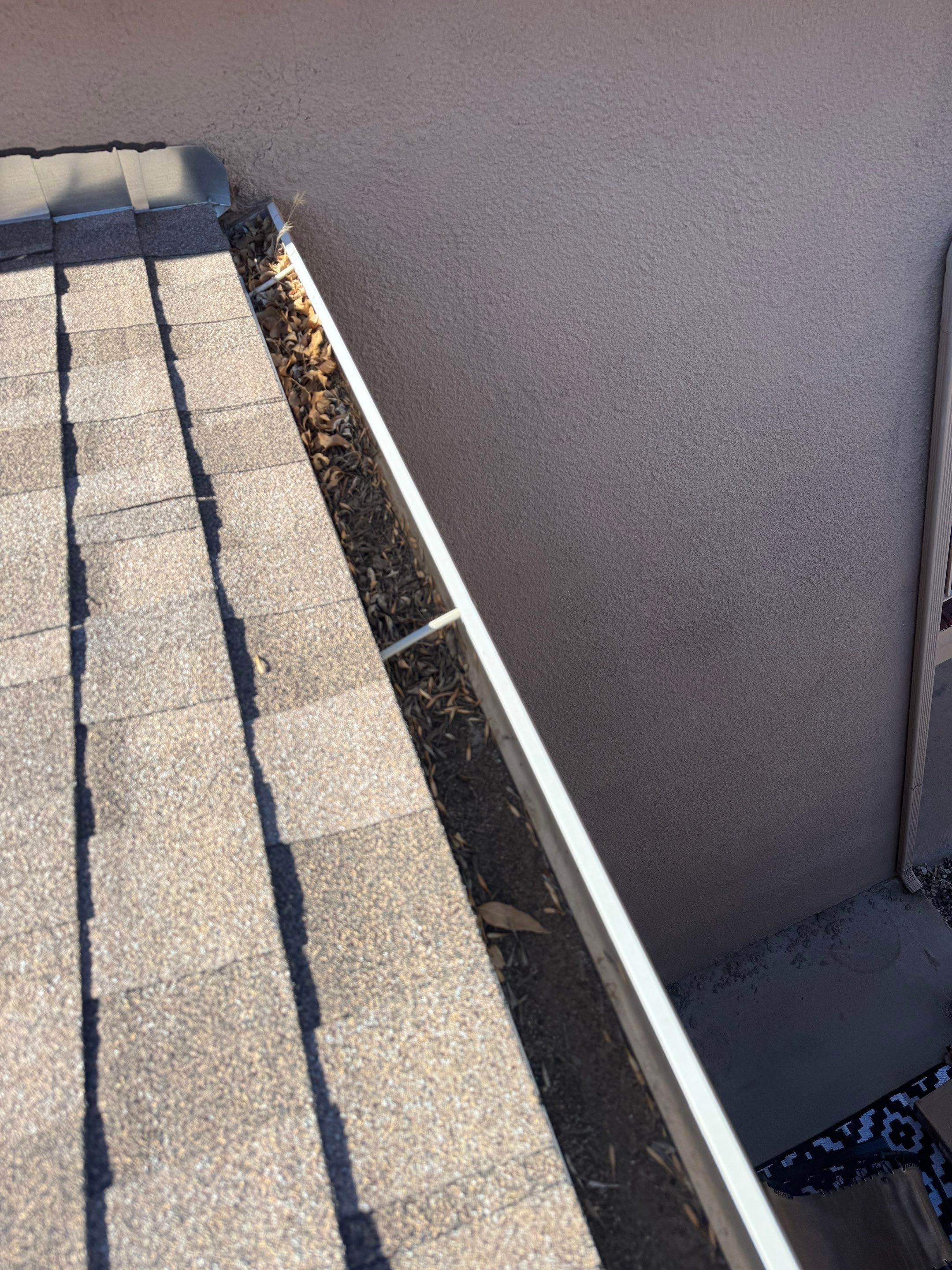 HOA gutter cleaning in Pinehurst & Southern Pines, NC,before photo showing full gutters.