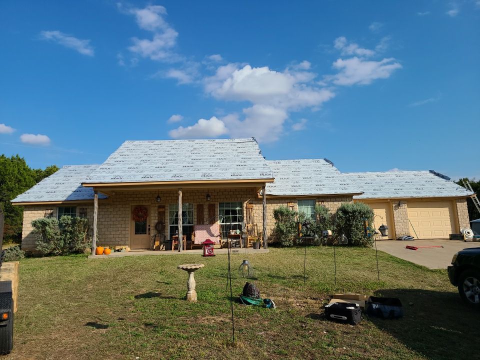 Residential Roofing Installation using PBR Metal Roof by Harvey Roofing & Construction