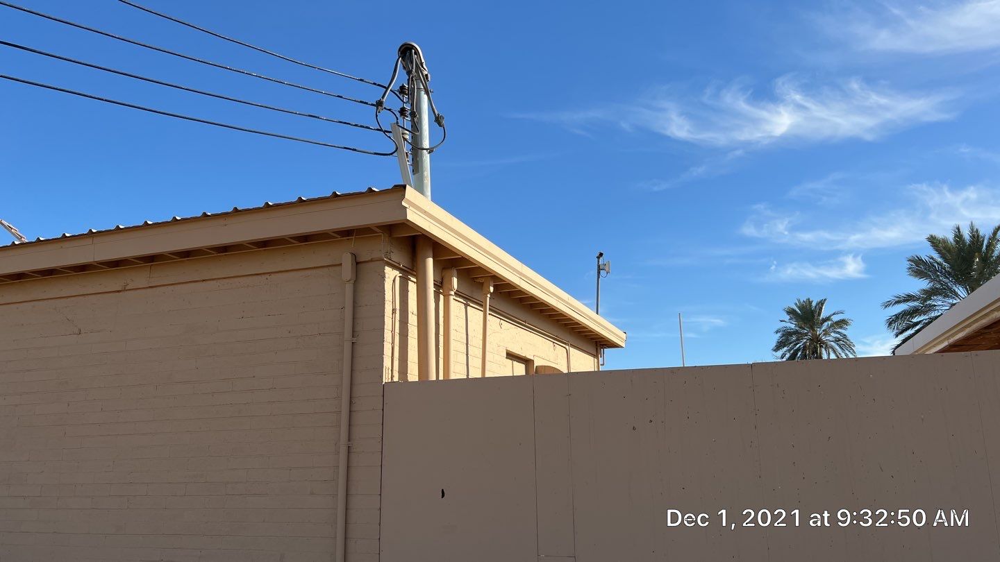 Metal roof restoration on commercial roof using Conklin Benchmark/PUMA XL fabric and coating by Straight Edge Roofing Inc