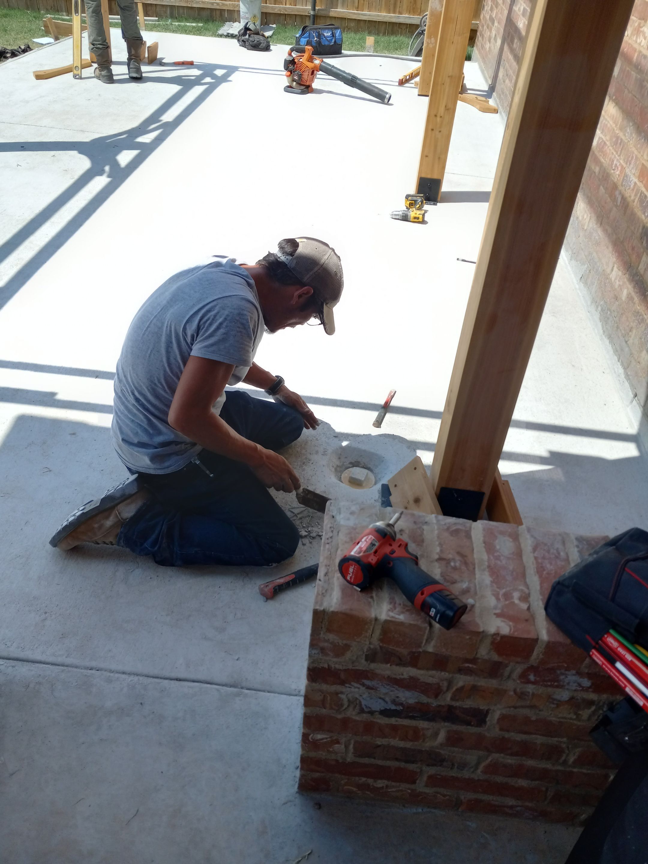 Concrete slab with Pergola by Clays Services Inc