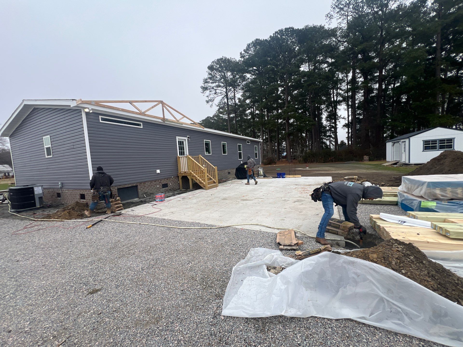 Custom Trex Covered Deck and Gabled Roof in Winterville by The Remodeling Company