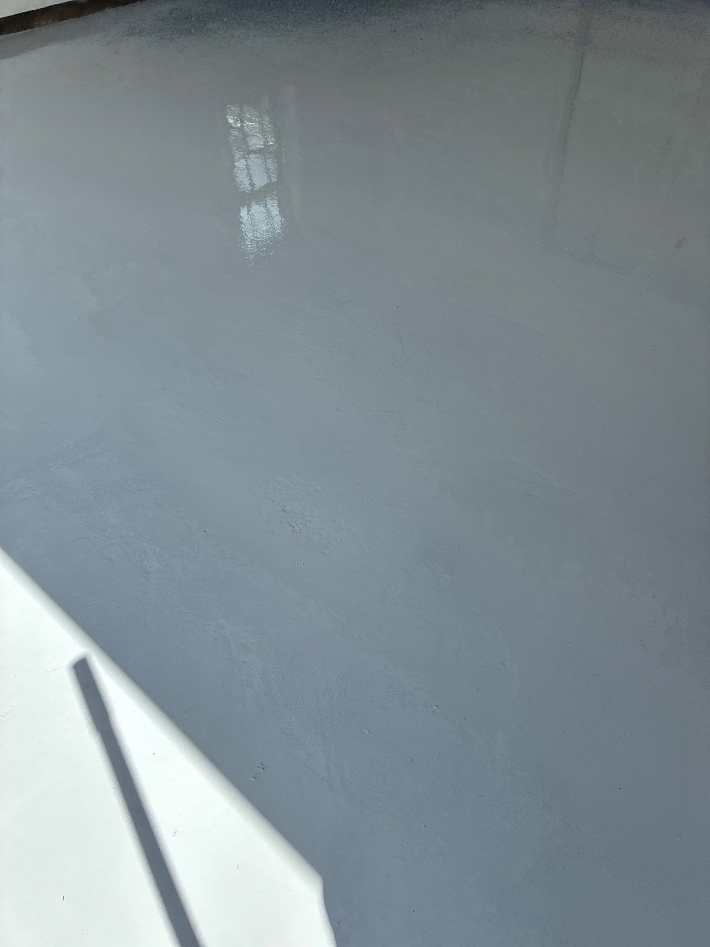 Basalt Concrete Floor Coating Transformation by DiGiorgi Roofing and Siding Inc