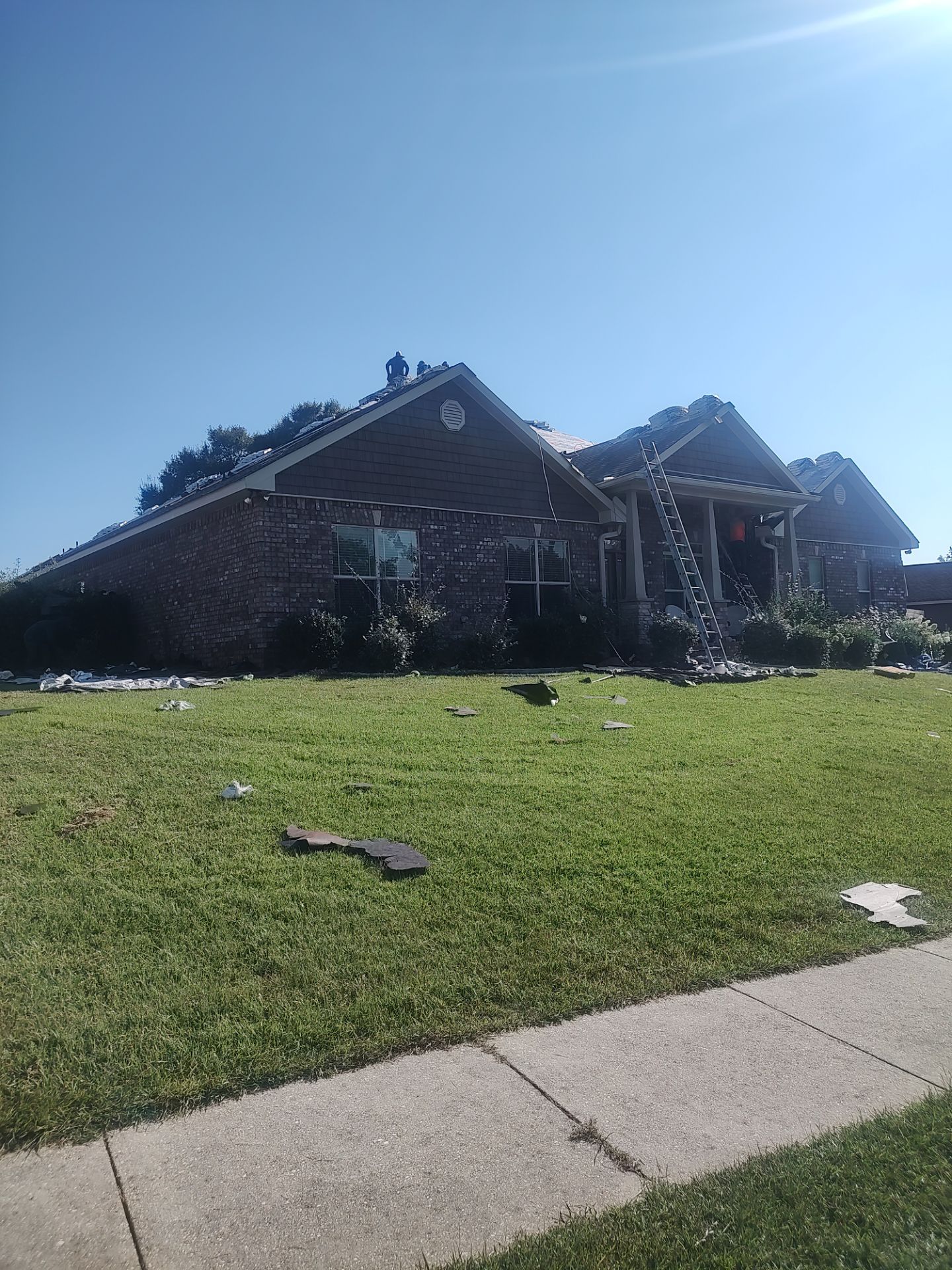 Residential Roof Replacement using ATLAS PROLAM WEATHER WOOD by Elite Roofing LLC