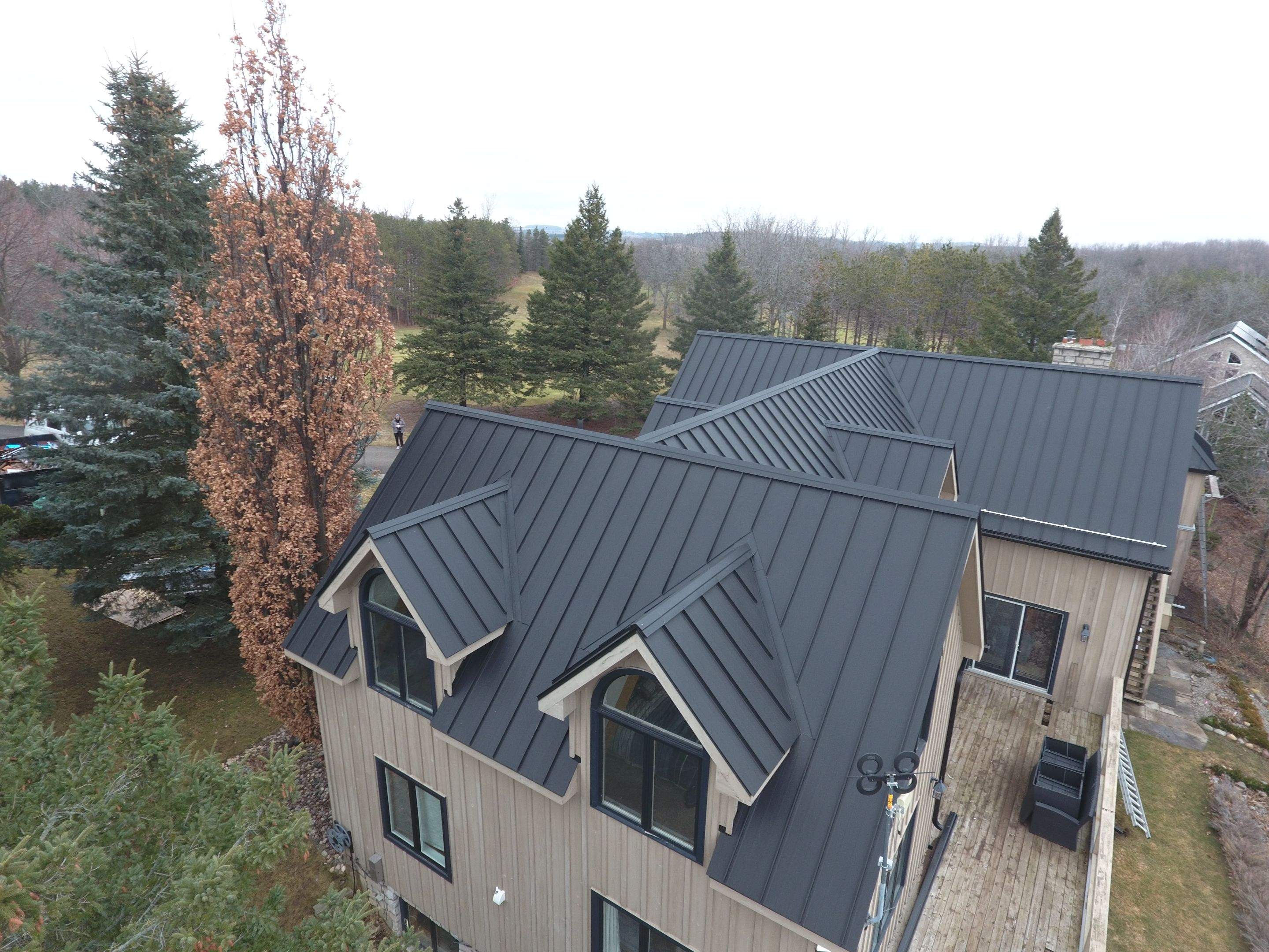 Residential Roofing Installation using 24 Ga Standing Seam Metal by Jay Carter Roofing & Sheet Metal