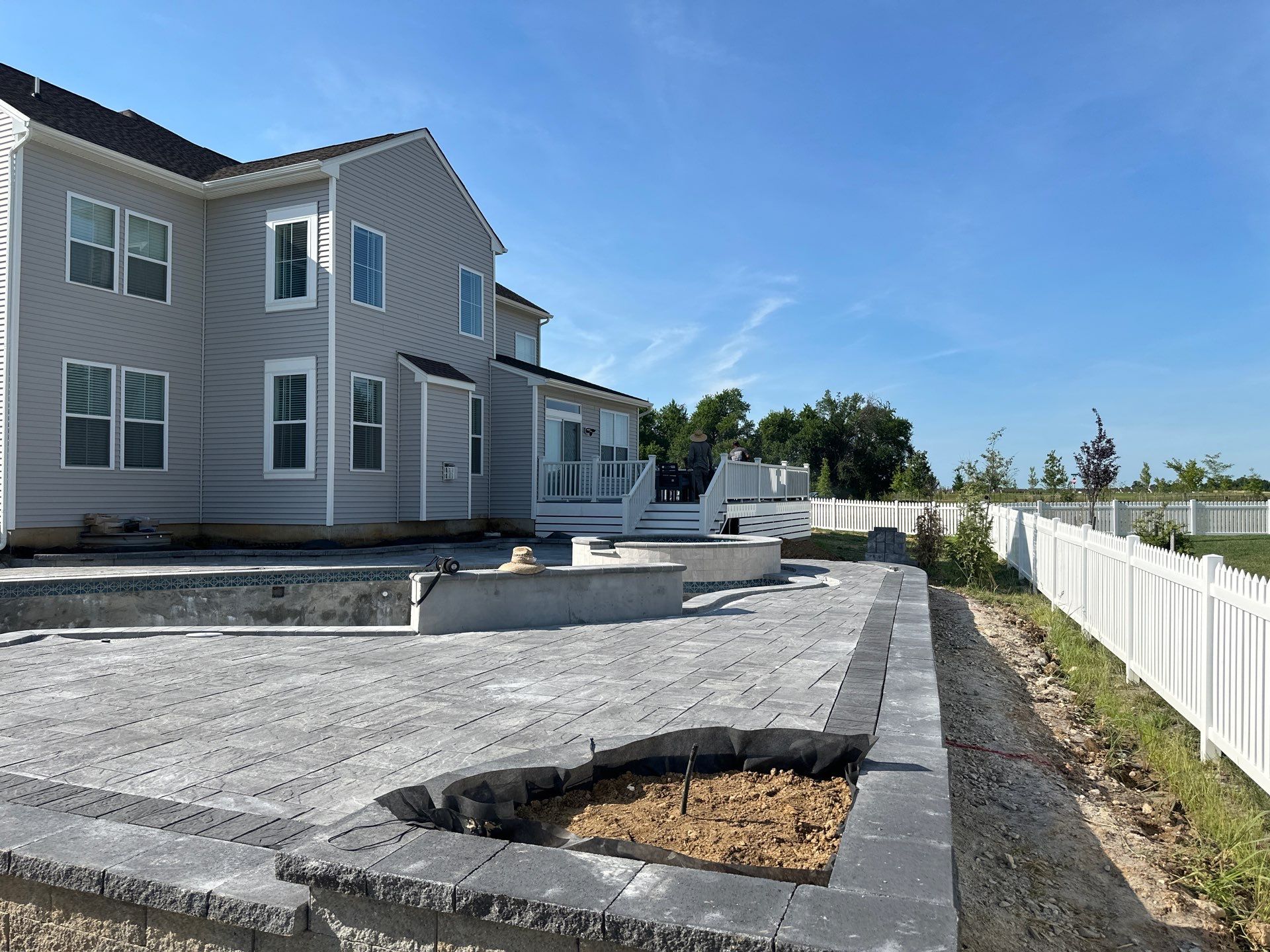 Pool and Hardscape Design in Delaware | Belgard Paver Patio & Outdoor Living Space by Studio G Indoor Spaces & Outdoor Living
