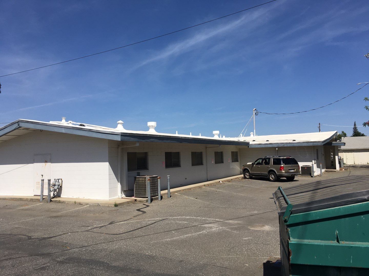 Spray foam and coatings using Conklin Benchmark/PUMA XL coatings and spray foam by Straight Edge Roofing Inc