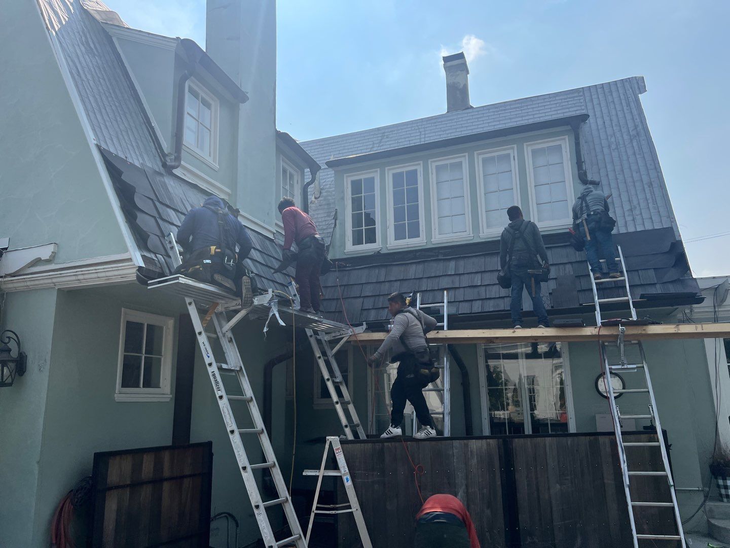 Slate removal/Cedar Shake replacement by Storm Contracting 