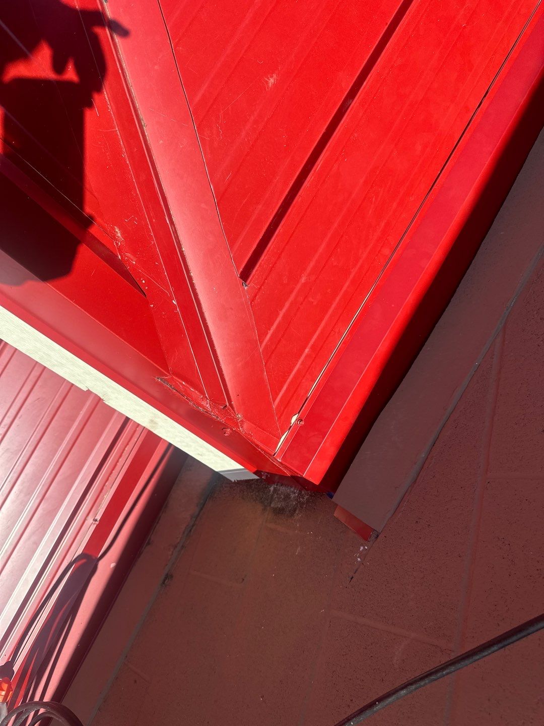 Commercial Roofing Installation using 12" Prolok metal  by Top Notch Roofing Inc