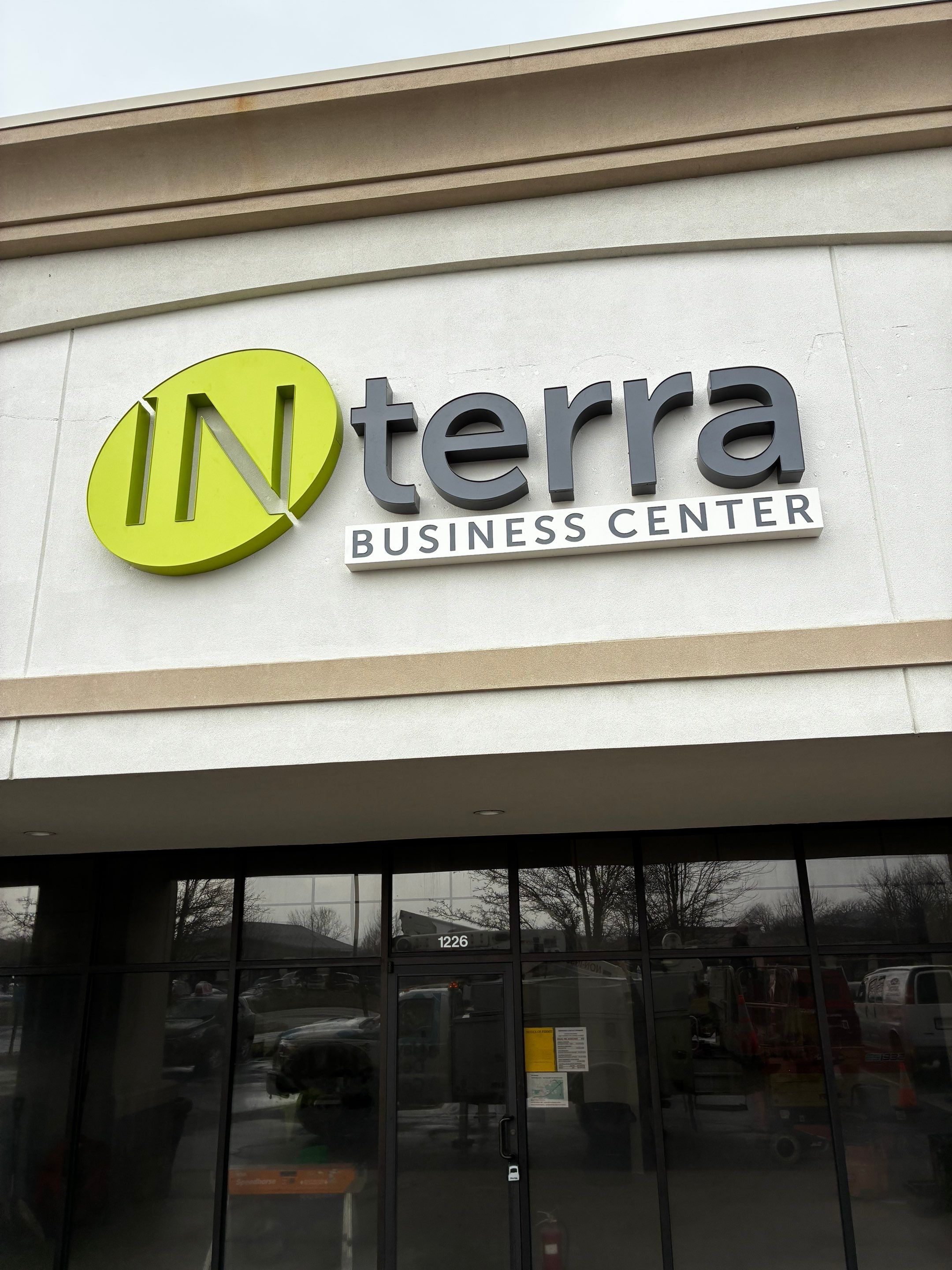 Building Signage Installation for INterra Business Center in Granger by Hayes Design co