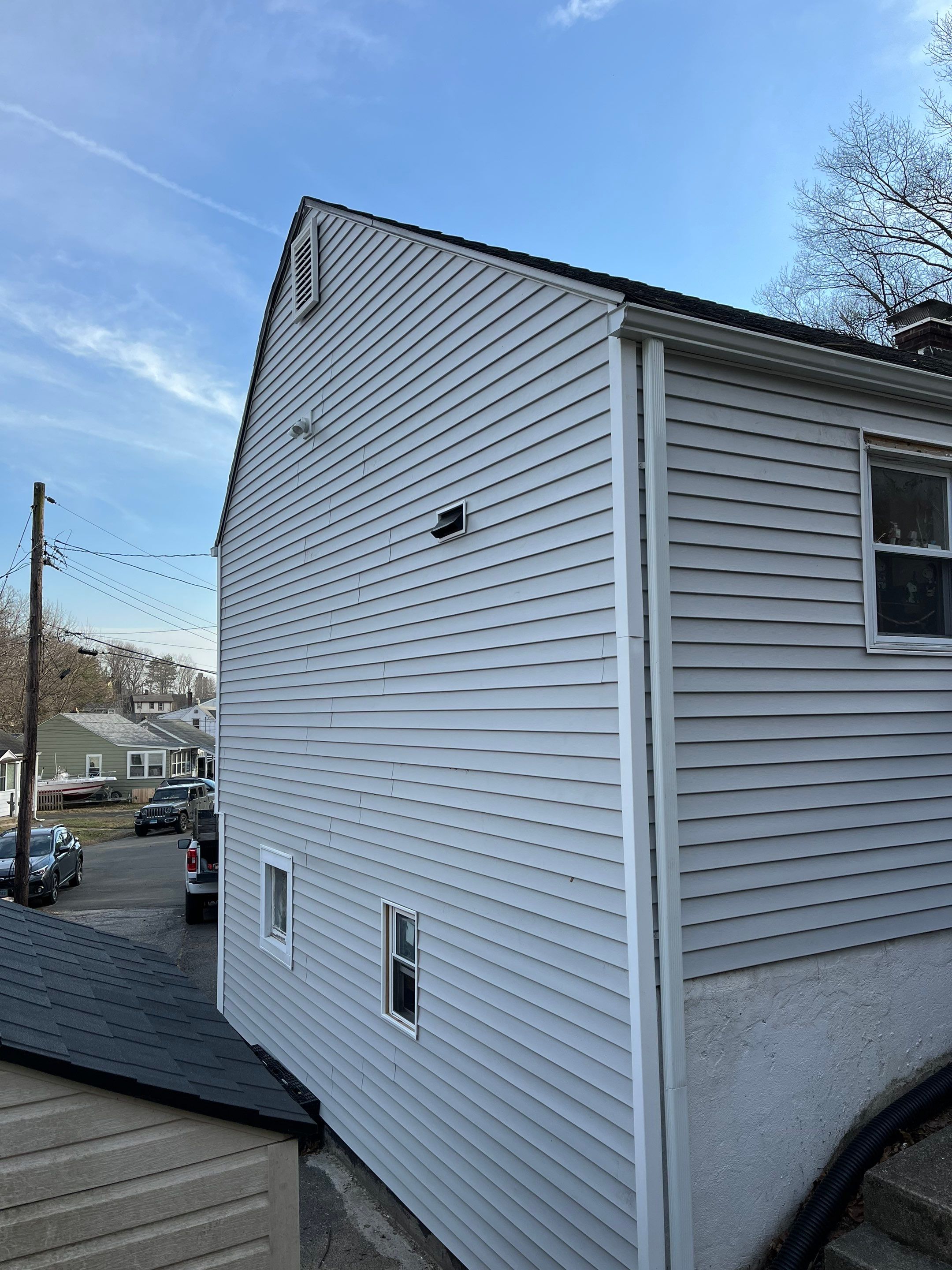 New Siding & Partial Chimney Rebuild by Regal Renovations