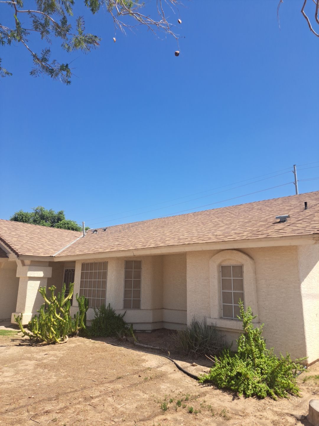 Desert Tan Shingles by Reimagine Roofing