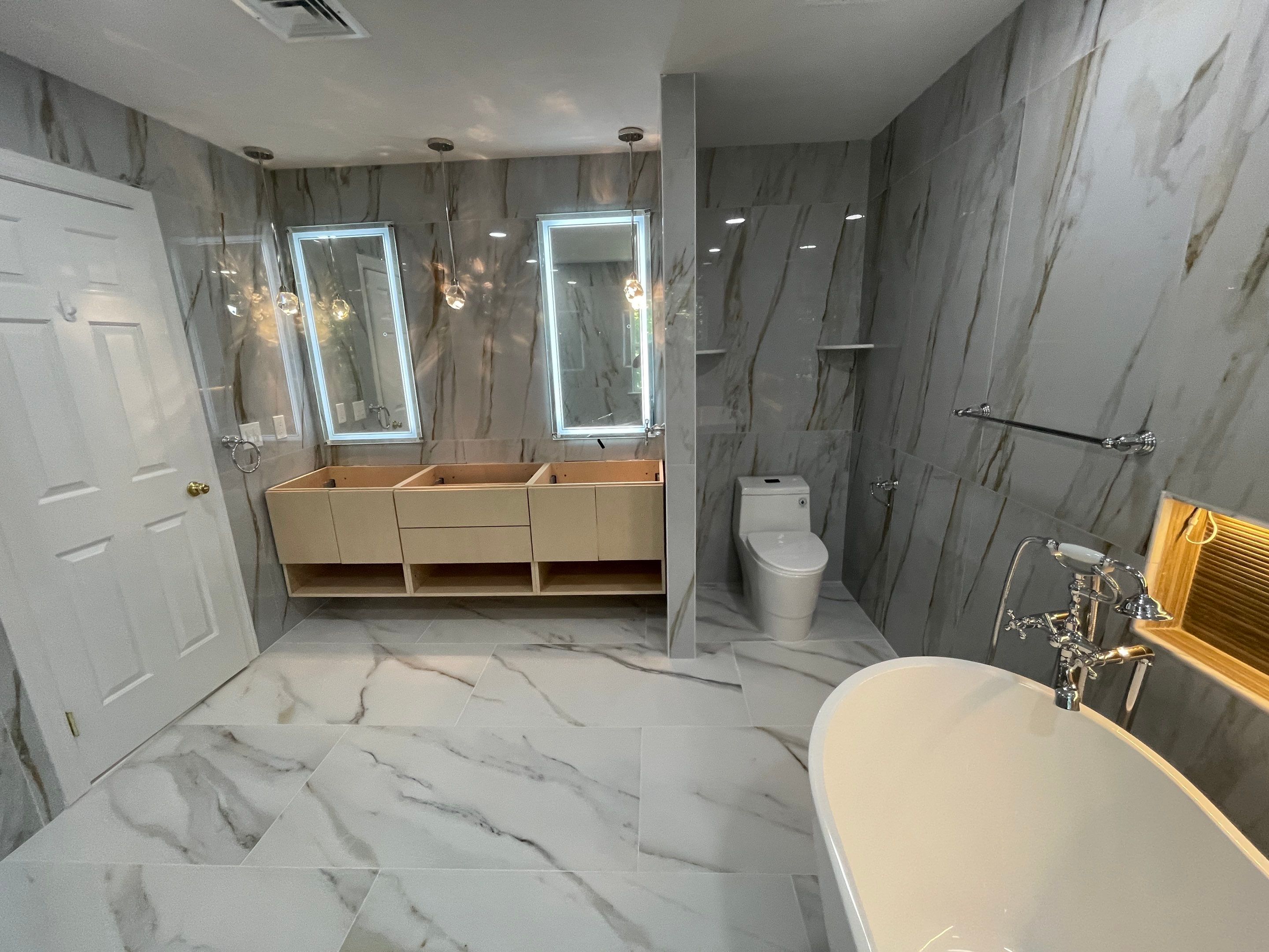 Bathroom Remodel using Tile by Home Concepts Construction