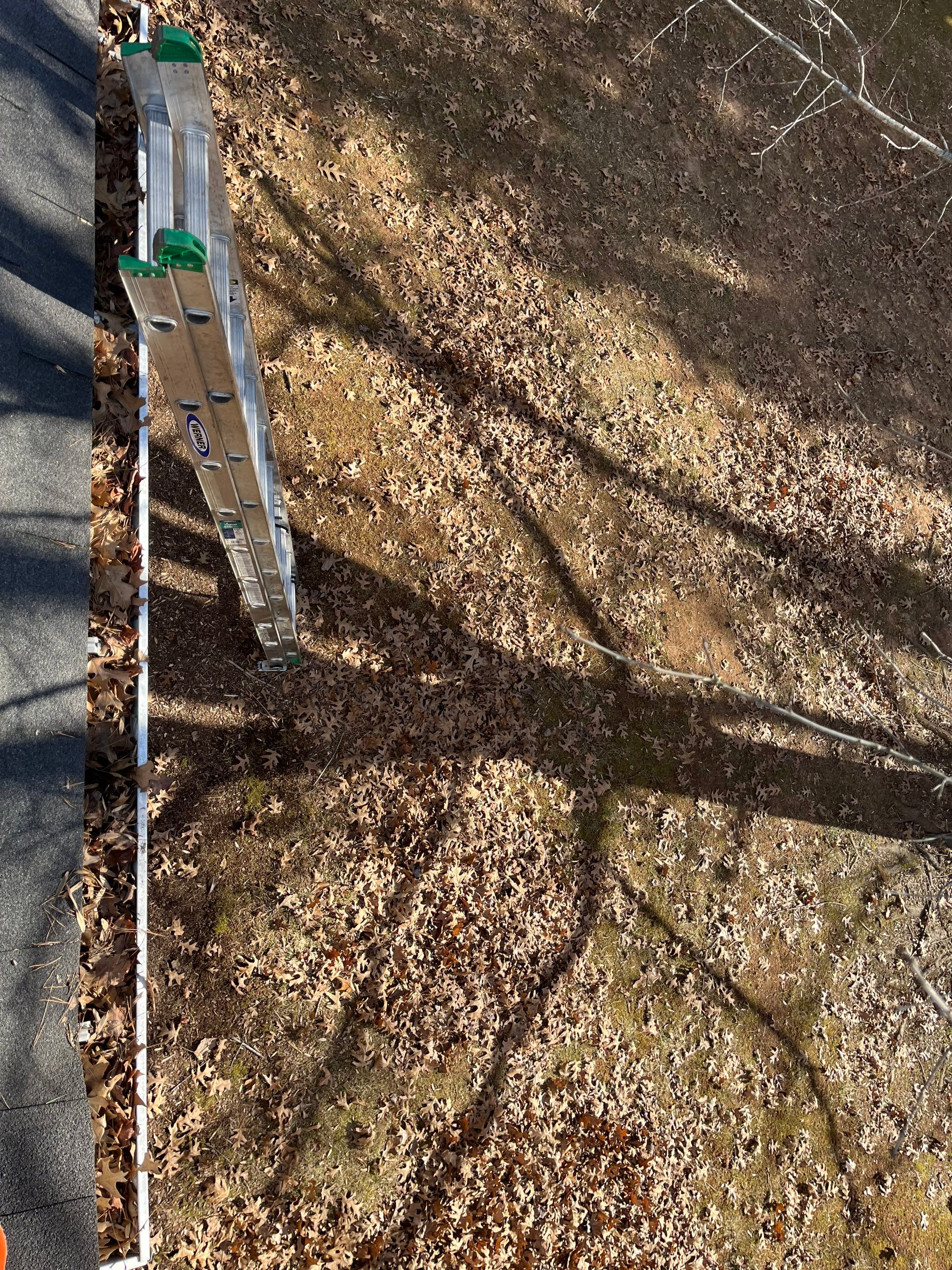 Commercial gutter cleaning Hickory & Statesville, NC before photo with filled gutters