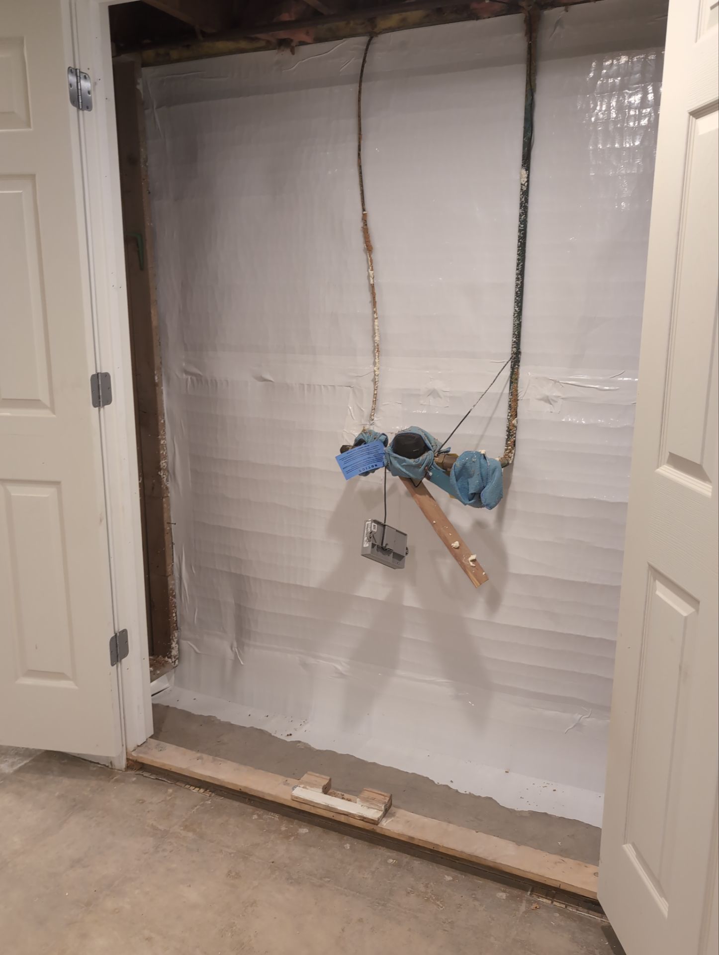 Interior Basement Waterproofing System and Egress Window Installation by Toledo Basement Repair 