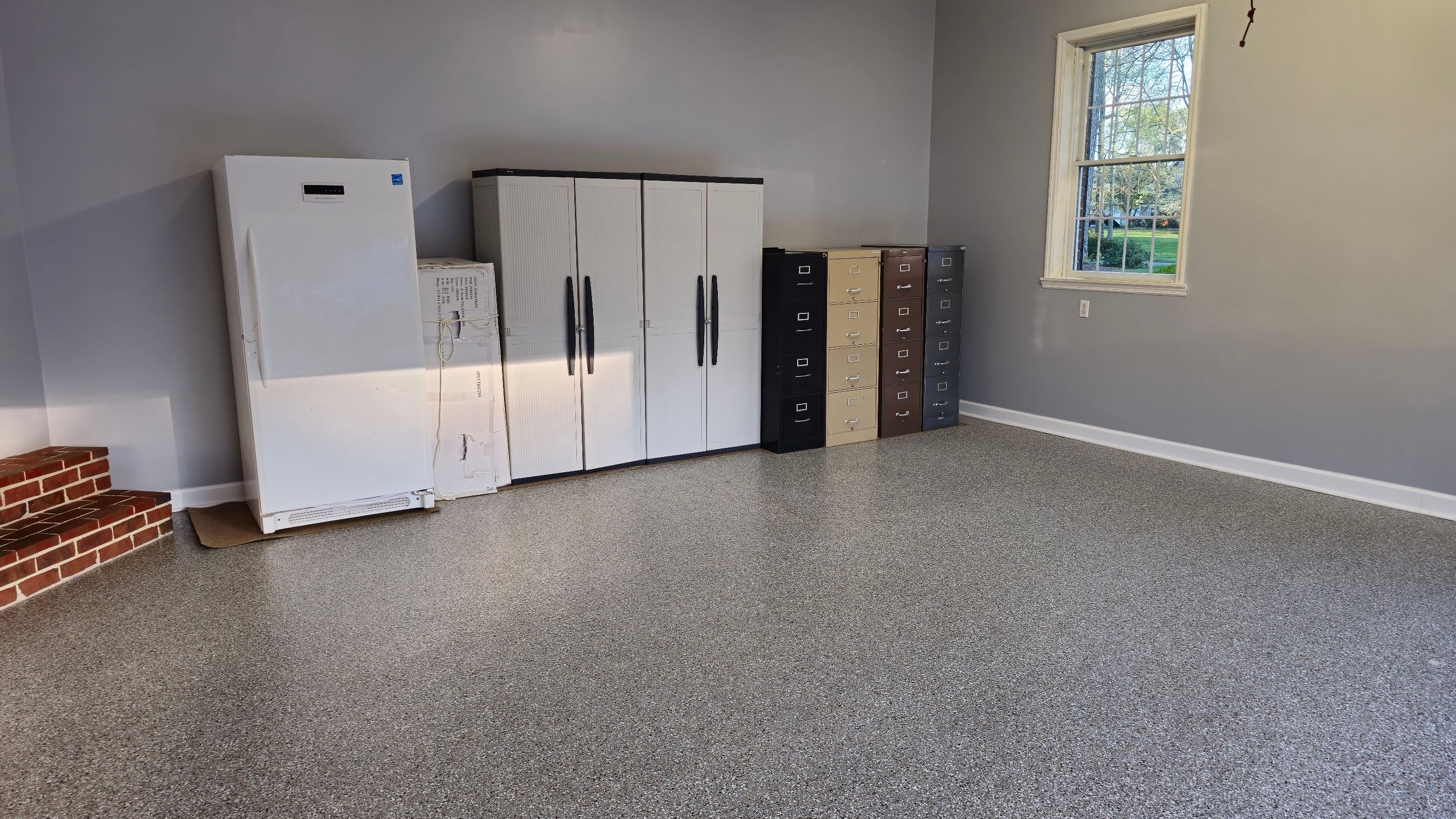 Garage using Creekbed by Elite Floor Solutions