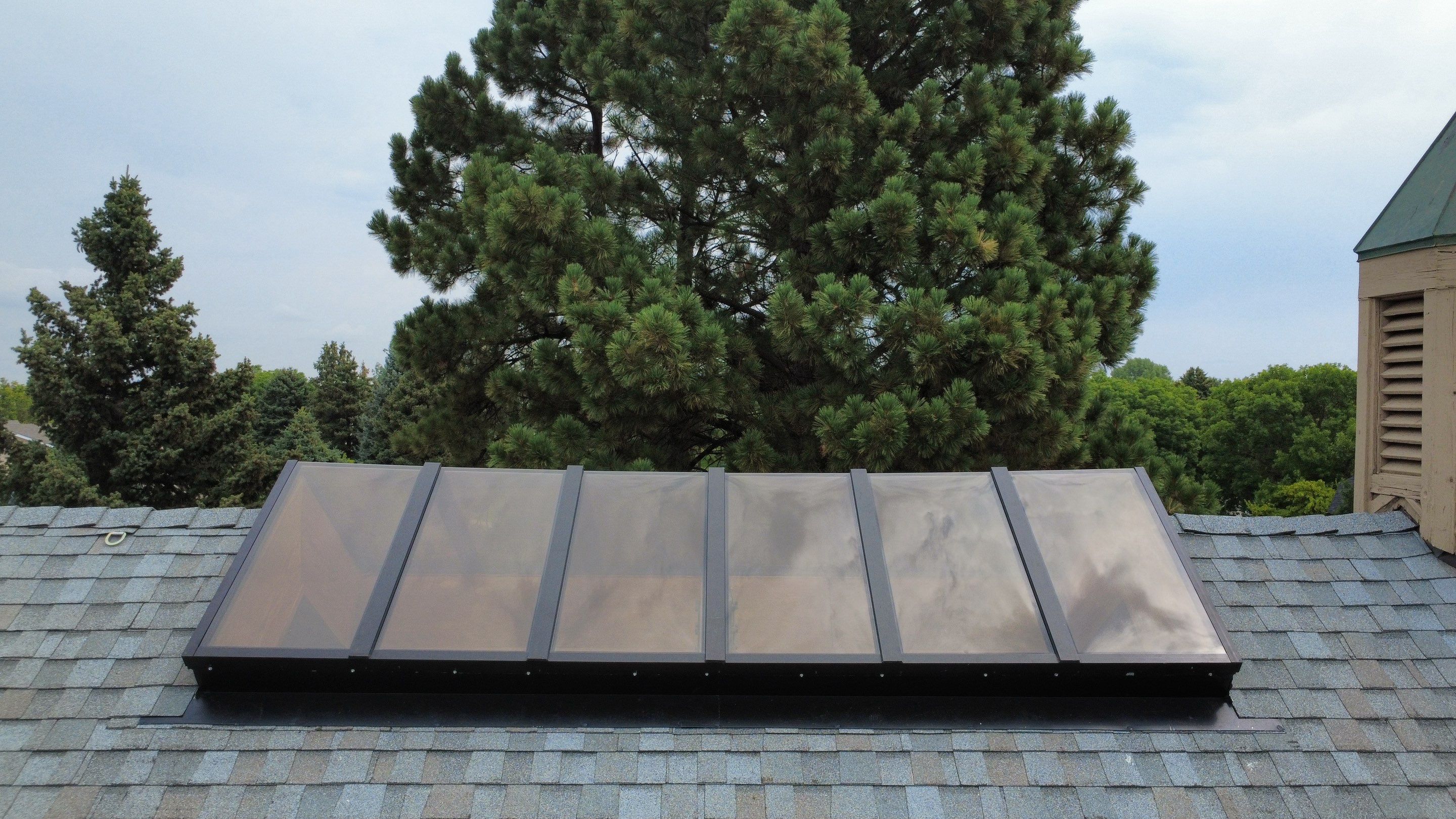 Asphalt Shingle and Skylight Replacement Project in Denver, CO by Blue Peaks Roofing LLC 