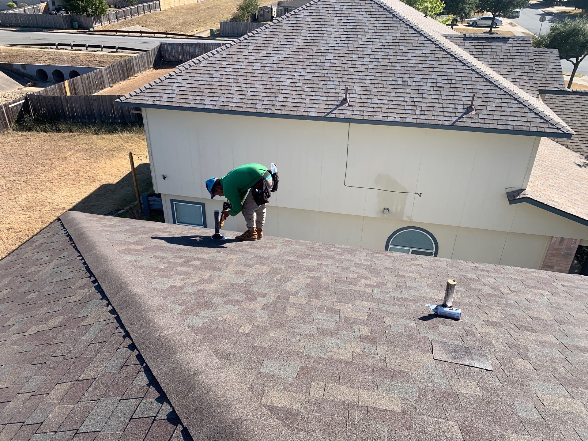 Asphalt Shingle Roof Replacement and Hail Damage Restoration in Hutto by Caliber Restoration LLC
