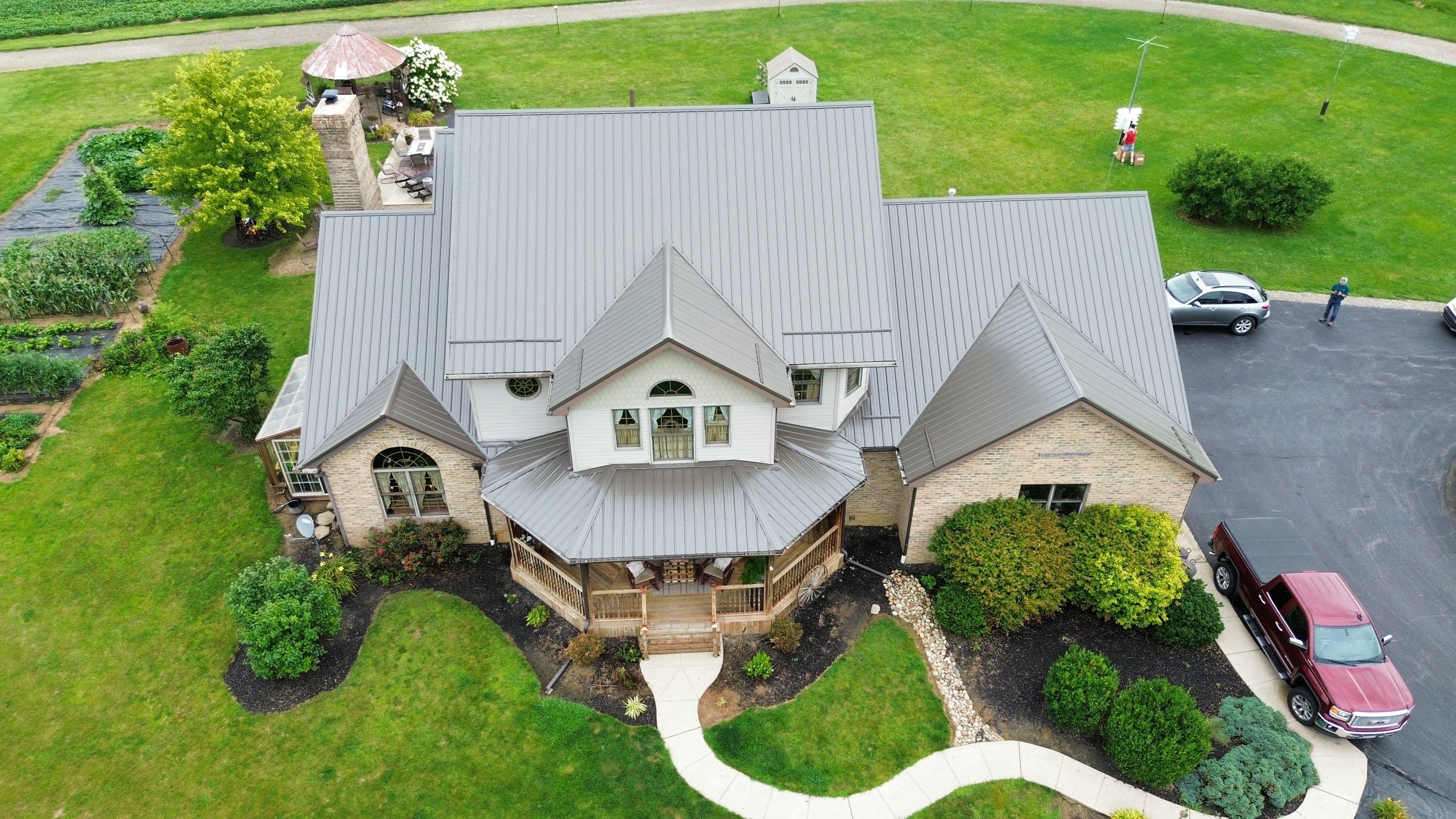 Residential Roofing Installation using Performance Panel Metal - Burnished Slate by RoofX 