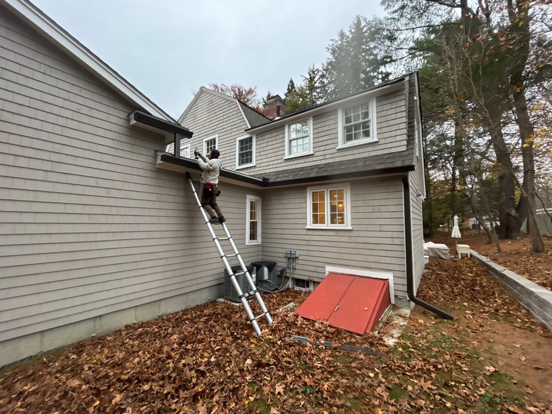 Andover Complete Gutter System with T-Rex Guards & Valley Splashguard by Mighty Dog Roofing of Greater Middlesex County