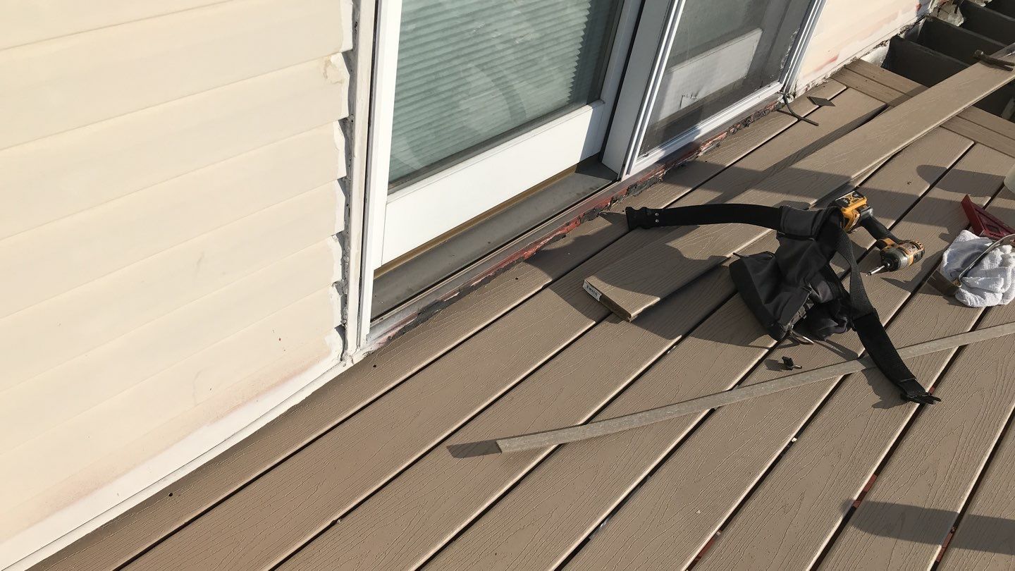 Deck Refurbush and Door Replacement using Trex Decking and Railing. Polaris Patio Doors by Secure Construction Company Inc