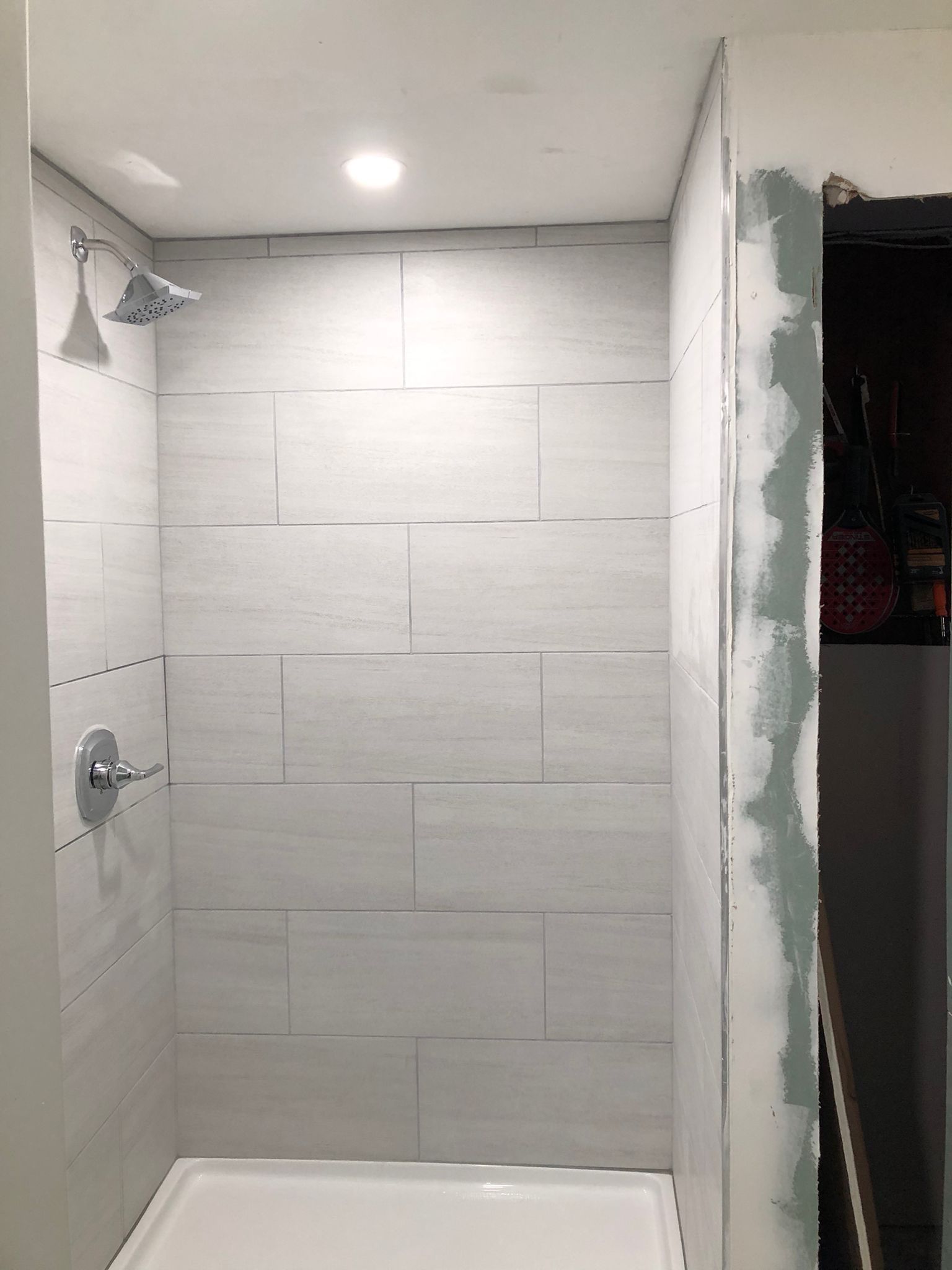 Basement Remodel using Tile by Home Concepts Construction