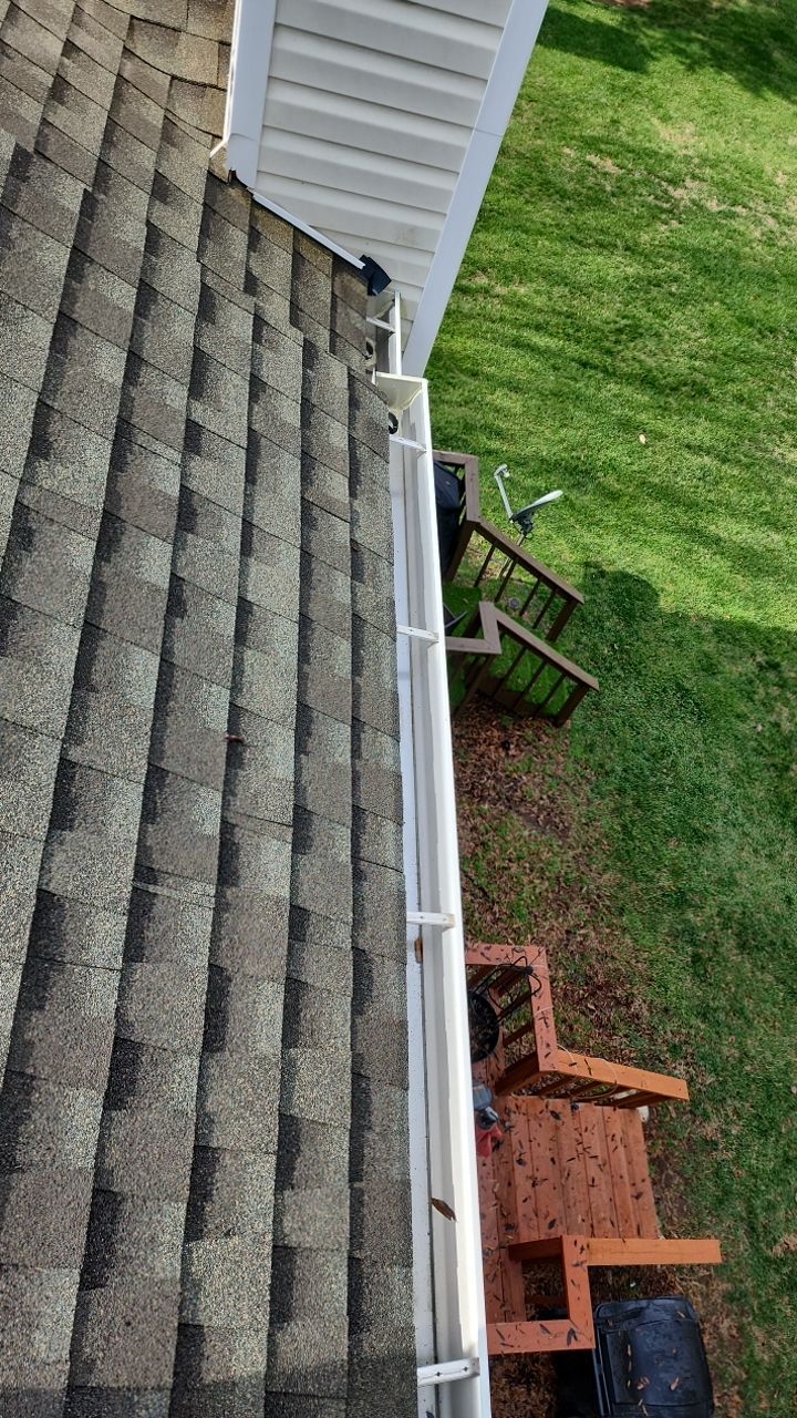 Gutter Cleaning using water by G&H Home Tech Pros LLC