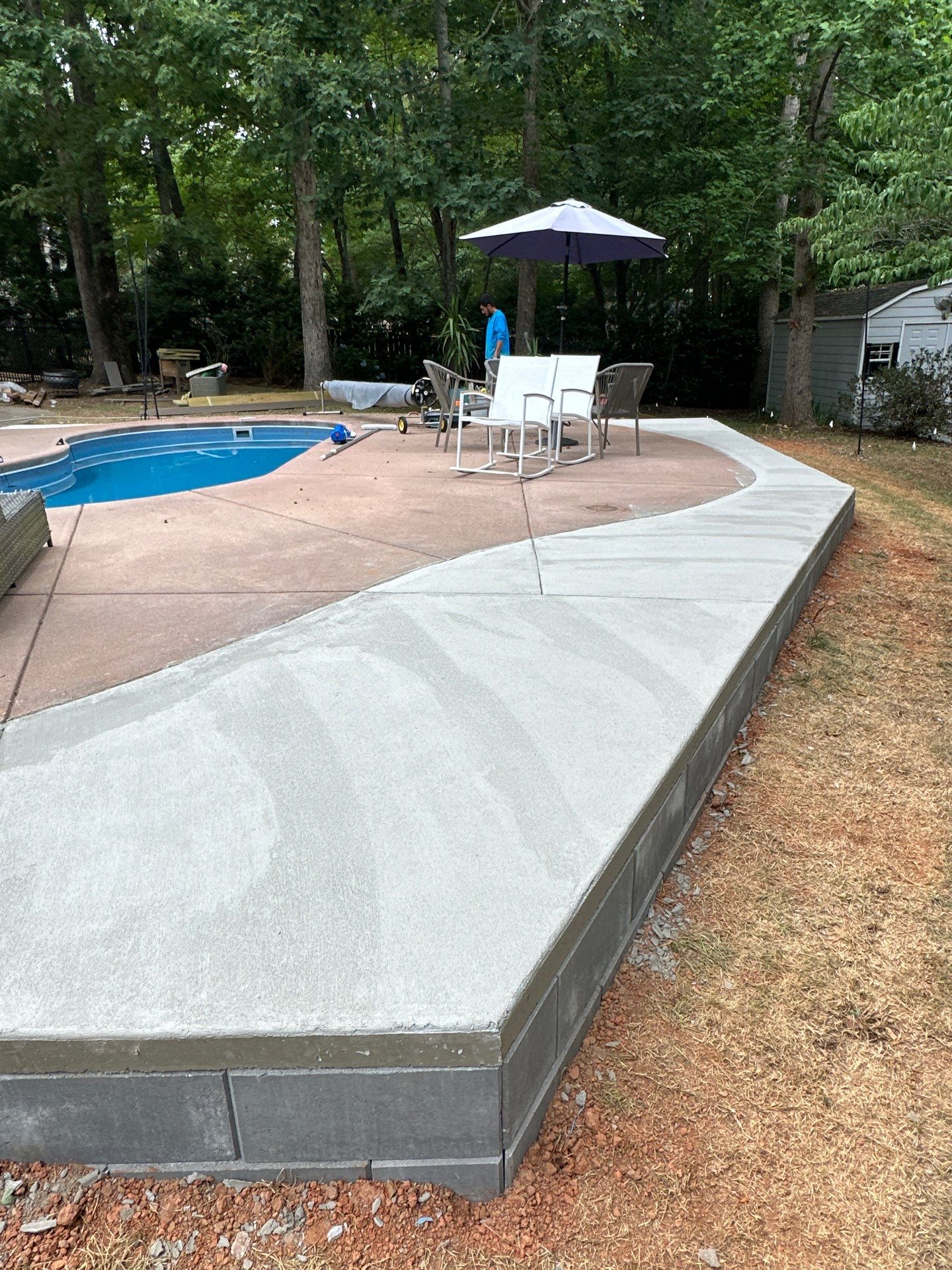 Cool decking pool in Youngsville by Martinez Brother’s Nc Landscaping Inc