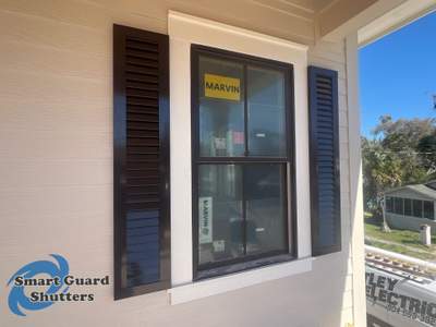 Decorative Colonial Shutters in Grey Brown