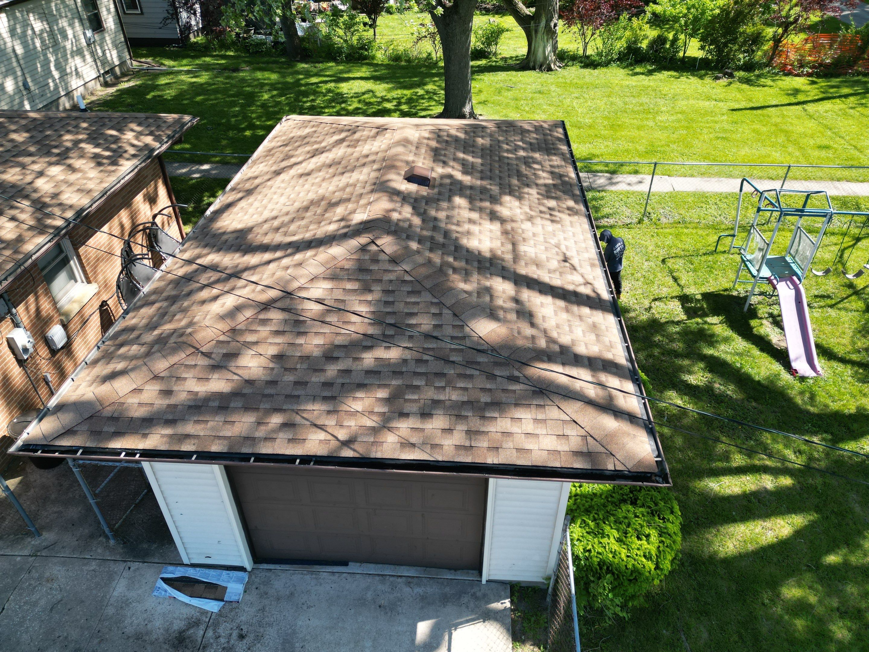 Roof replacement by Optimal Home Improvement 