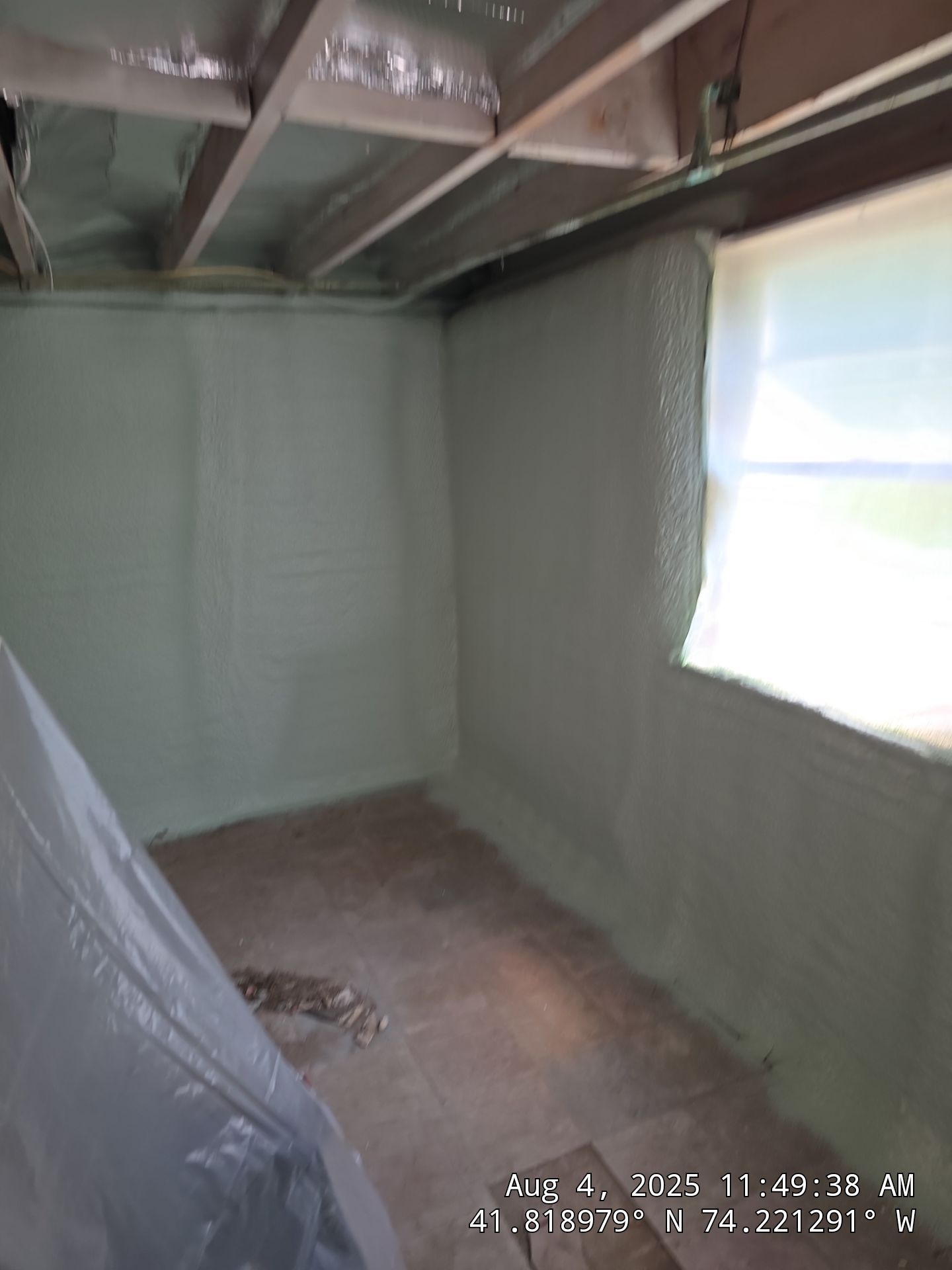 Master bedroom Exterior Walls using open cell spray foam by NYS Foam & Energy