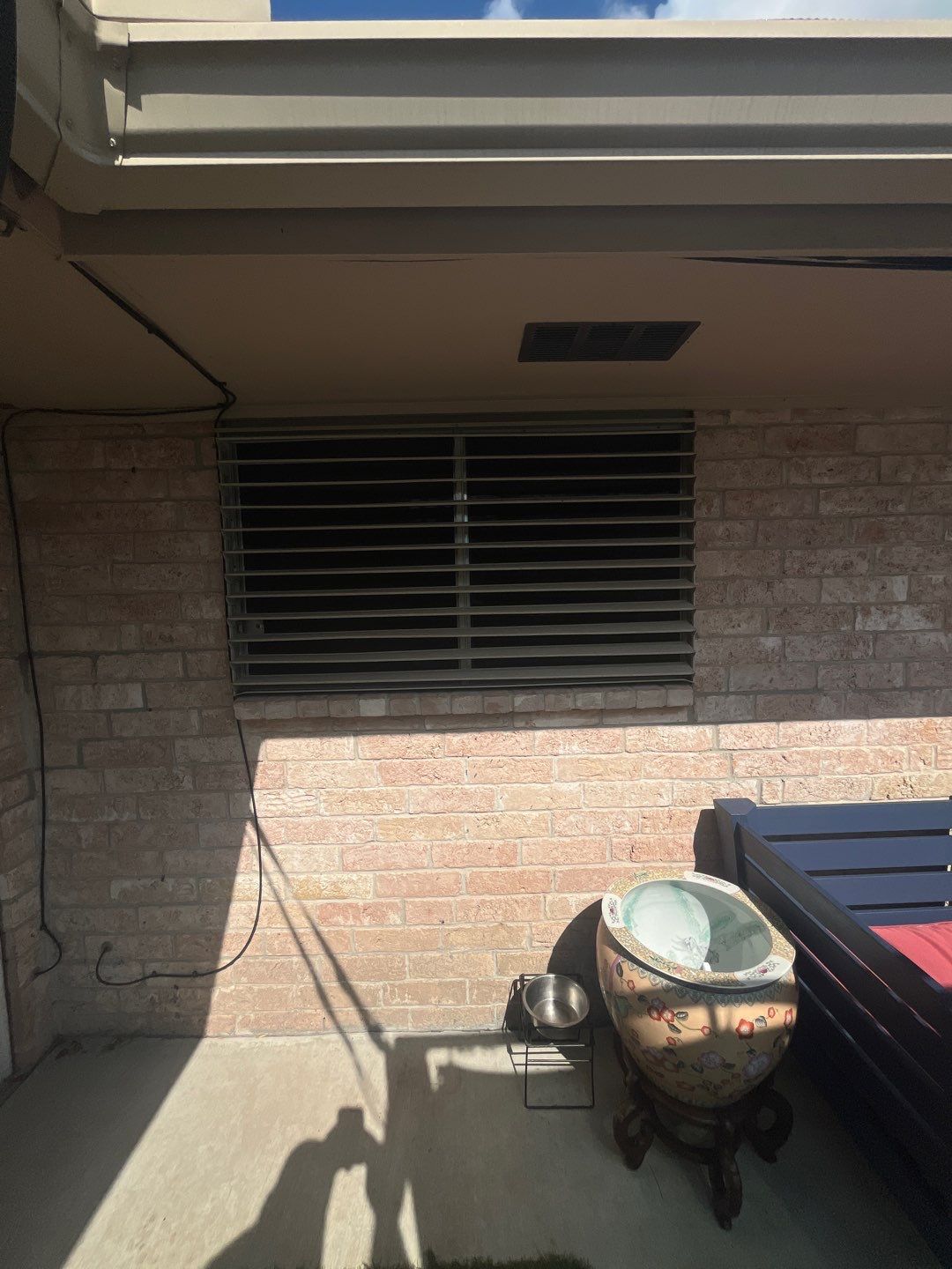 Colored Vinyl Windows to blend into brick by Bayfront Roofing and Construction