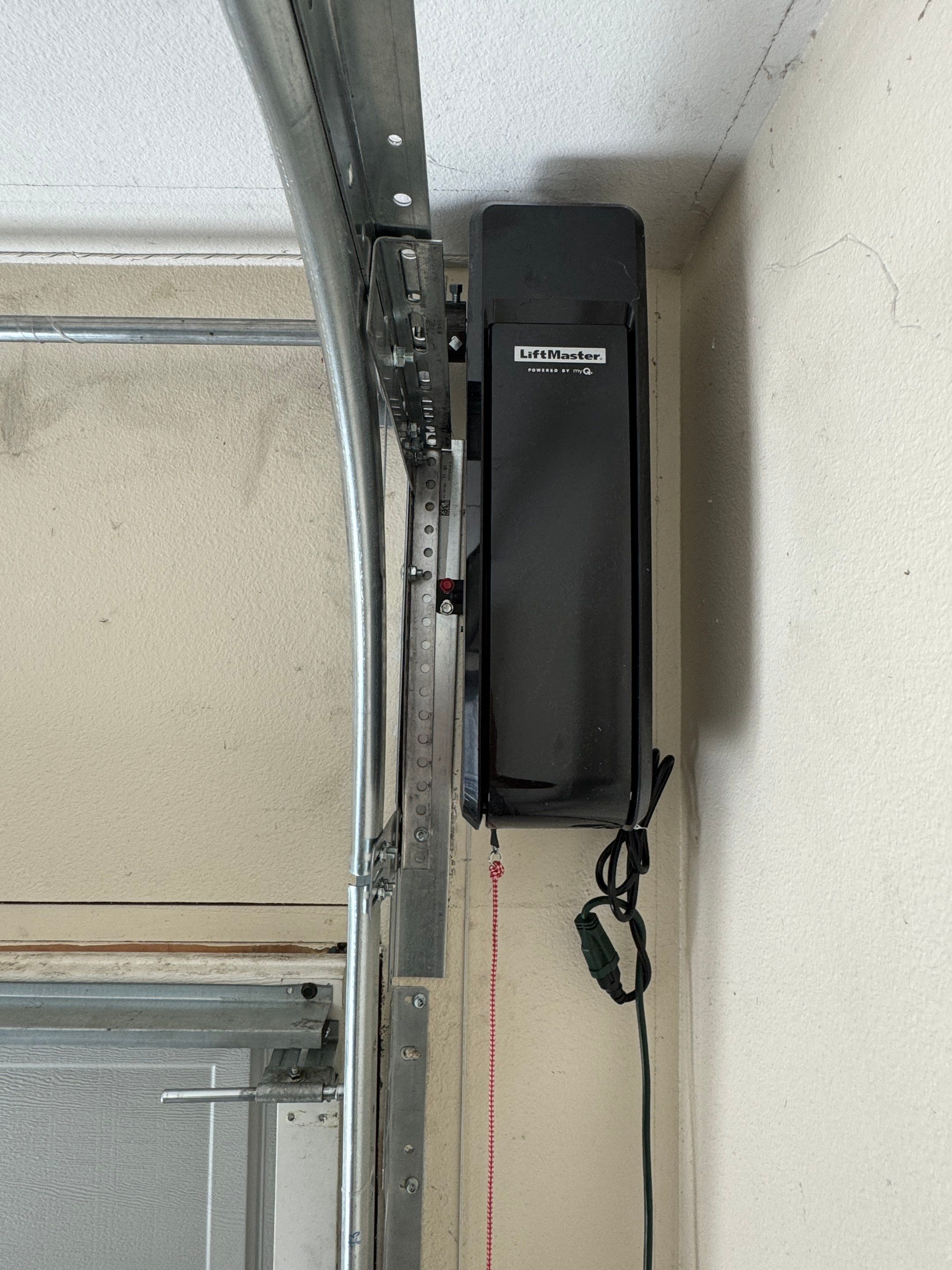 LiftMaster Side Mount Opener and High-Lift Track Installation in Plano by Meadows Garage Doors