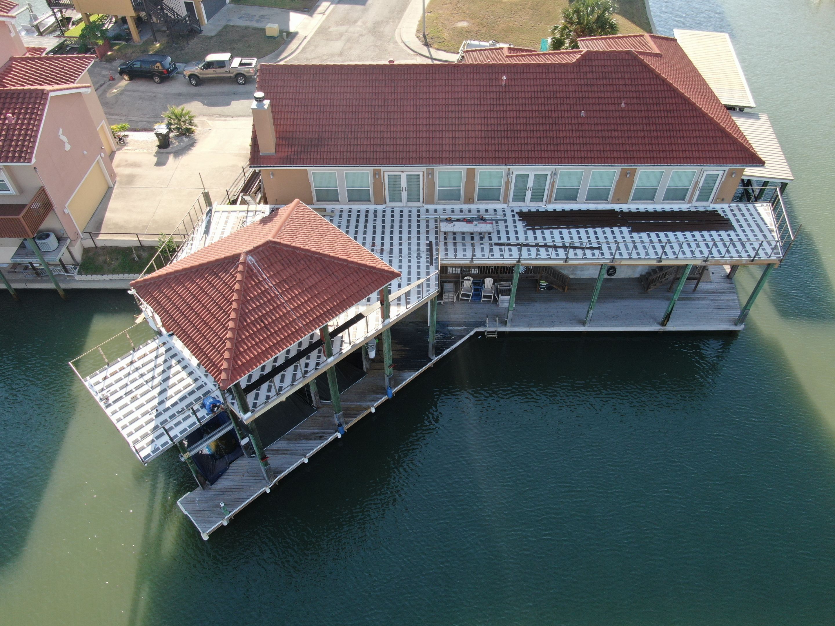 Walk Out Patio Cover by Bayfront Roofing and Construction