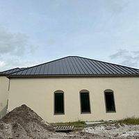 24ga 1.5" Mechanical Seam Dark Bronze by Total Roofing System The Metal Roof Experts