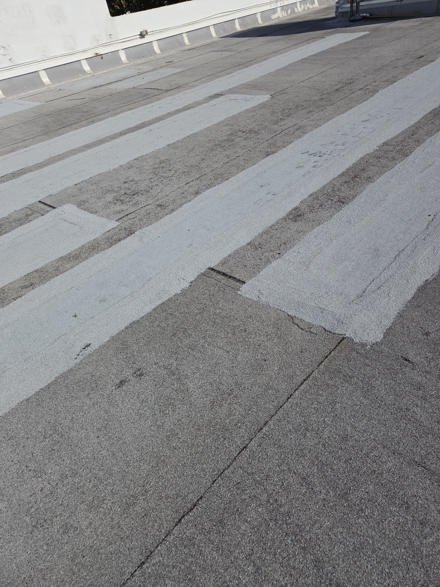 Commercial Flat Roof Restoration Using Silicone Coating in Hallandale Beach by Aastro Roofing