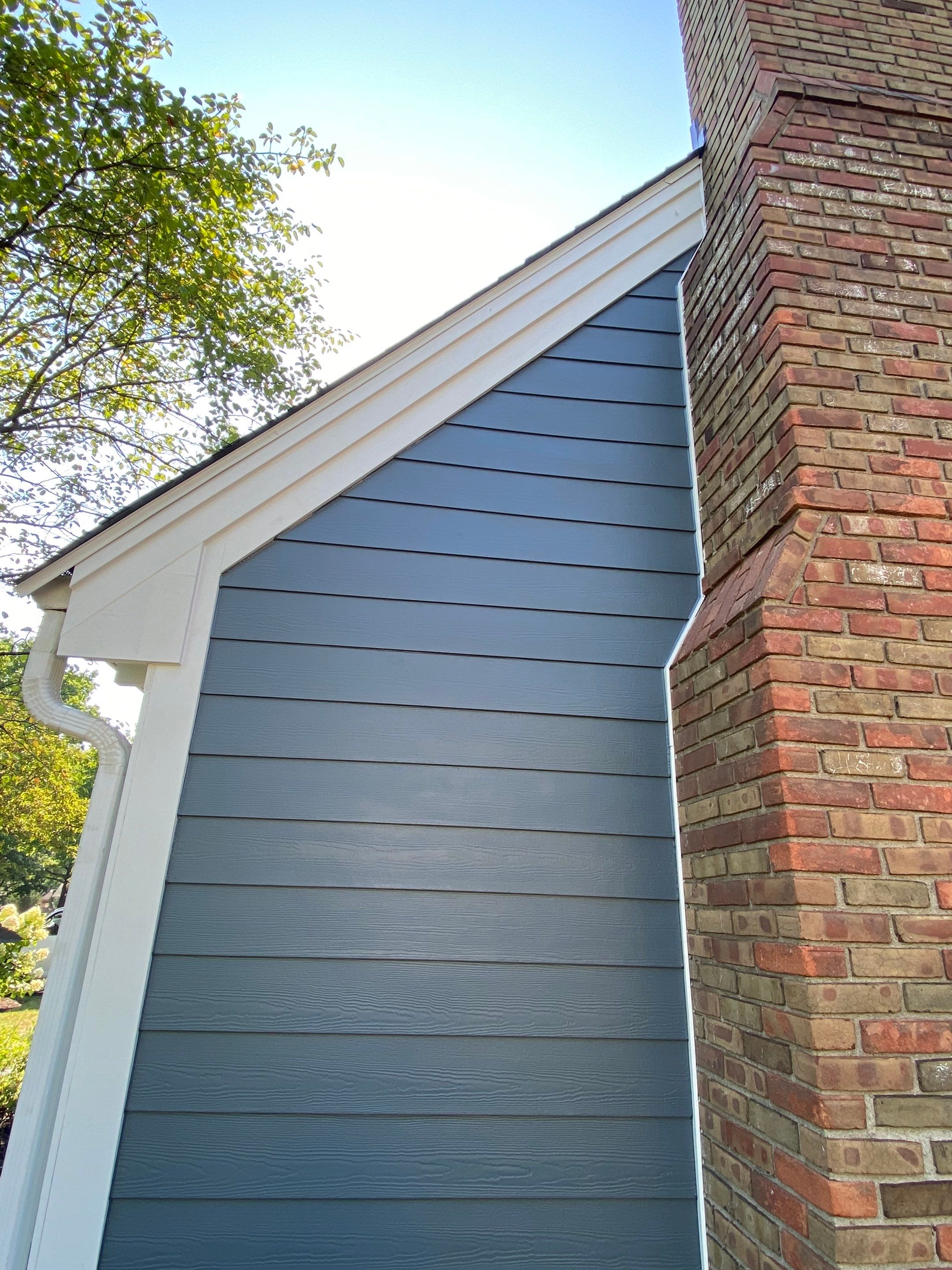 Residential Roofing Installation using James Hardie Fiber Cement Lap Siding and Certainteed Landmark Pro Shingles by Best Exteriors Inc