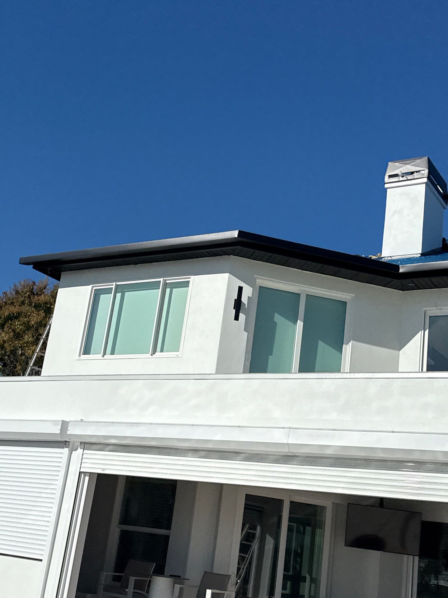 Soffit and Fascia Installation and black seamless gutters in Sarasota FL by Gutter Professors