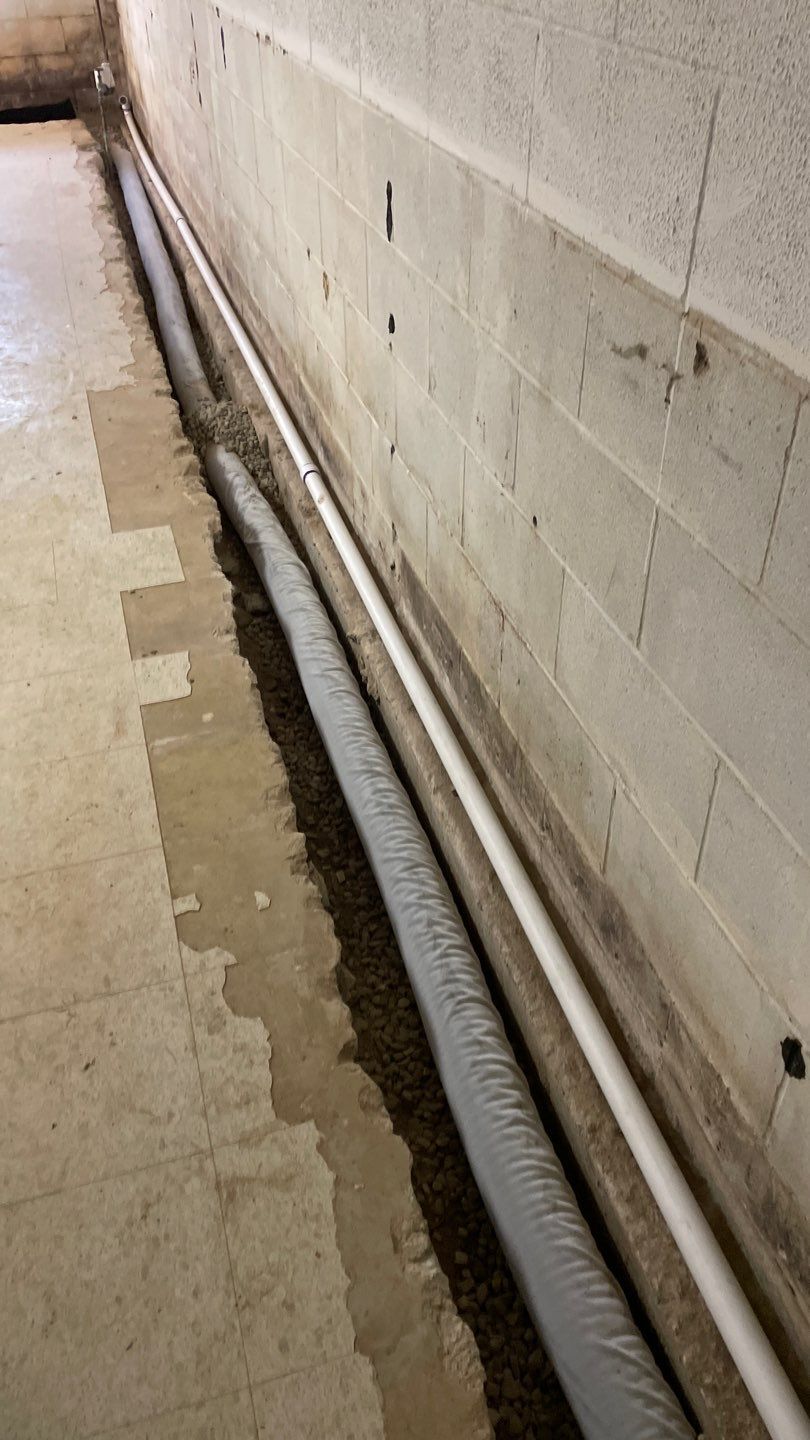 Interior Drain Tile Installation in Columbia Heights, MN by Waterproofing Northeast